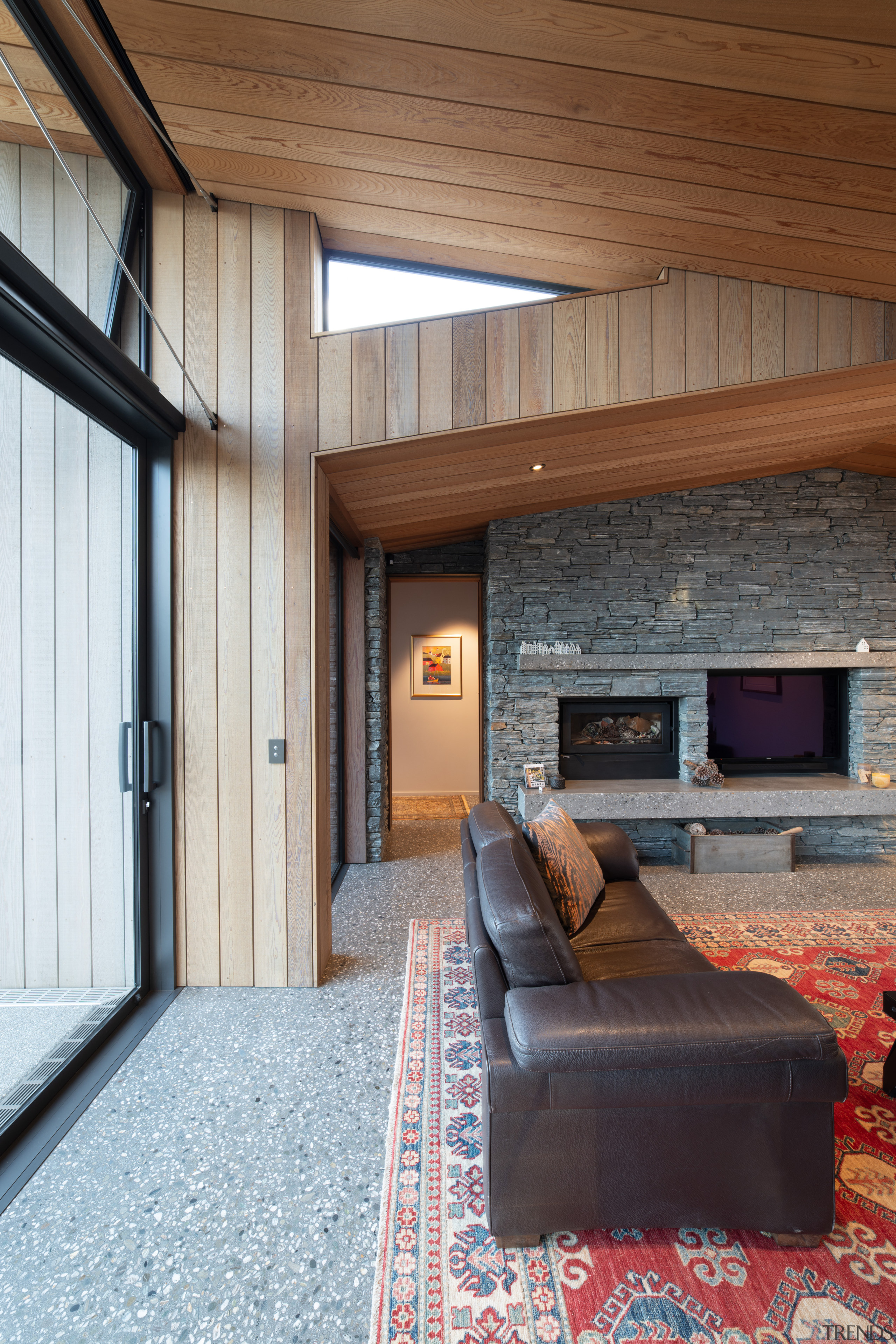 ​​​​​​​Responding to the articulated roofline, the cedar ceilings 