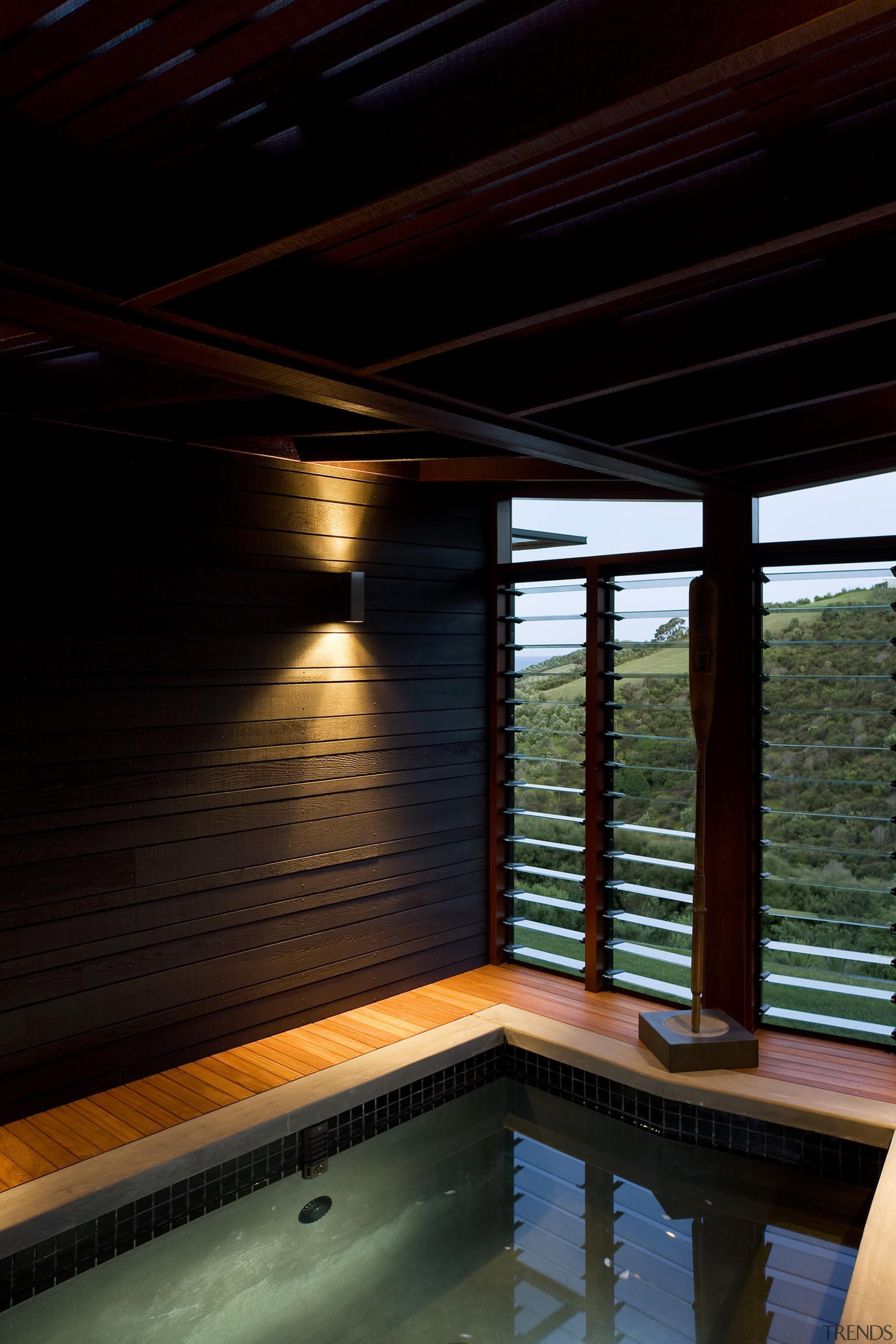 Waiheke Island, Auckland - Owhanake Bay - architecture architecture, daylighting, home, house, interior design, lighting, reflection, sunlight, swimming pool, water, window, wood, black