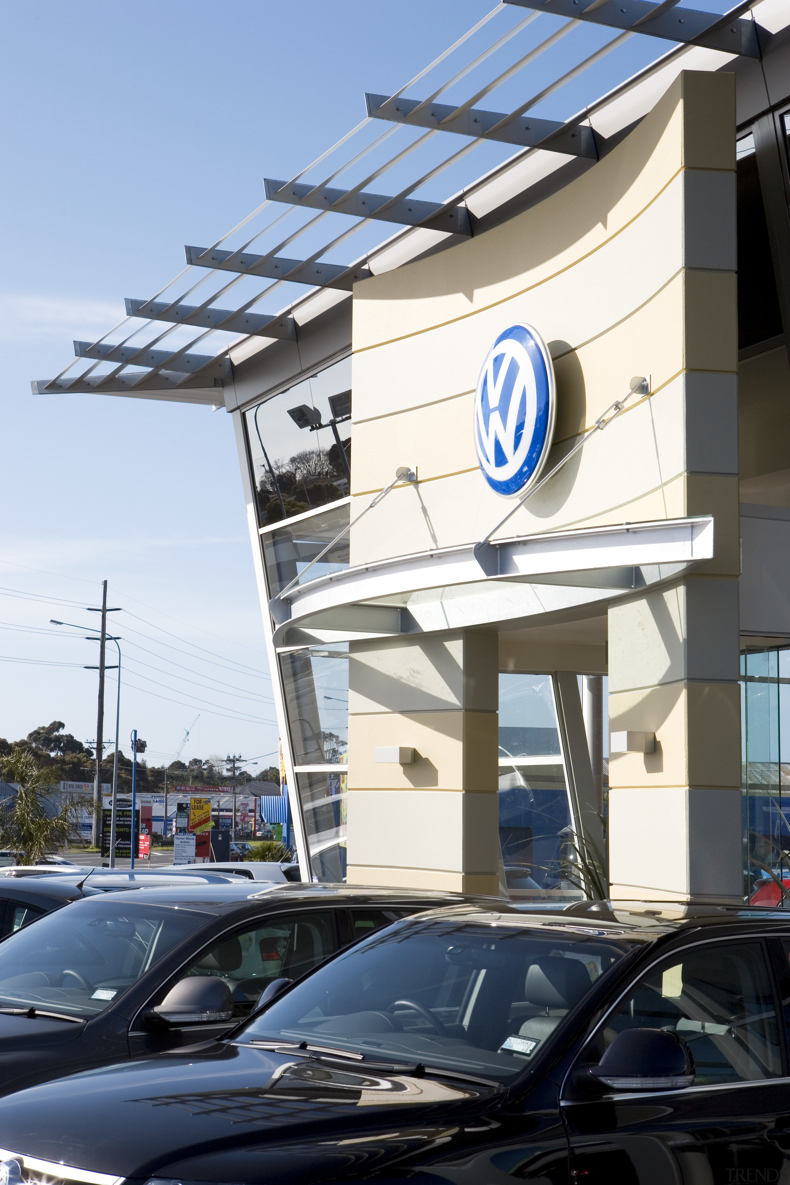 View of Tristram European's new VW showroom which architecture, automotive exterior, building, car, daytime, family car, motor vehicle, sky, technology, vehicle, white, black