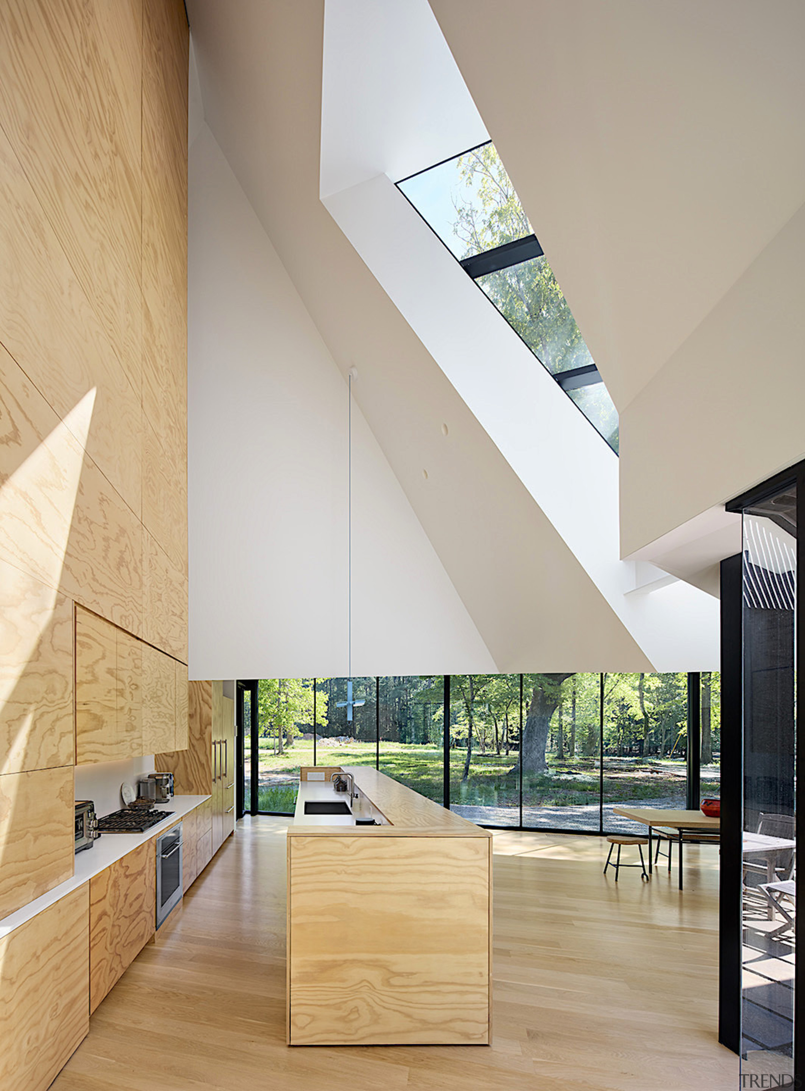 The pared back plywood kitchen under a truly 