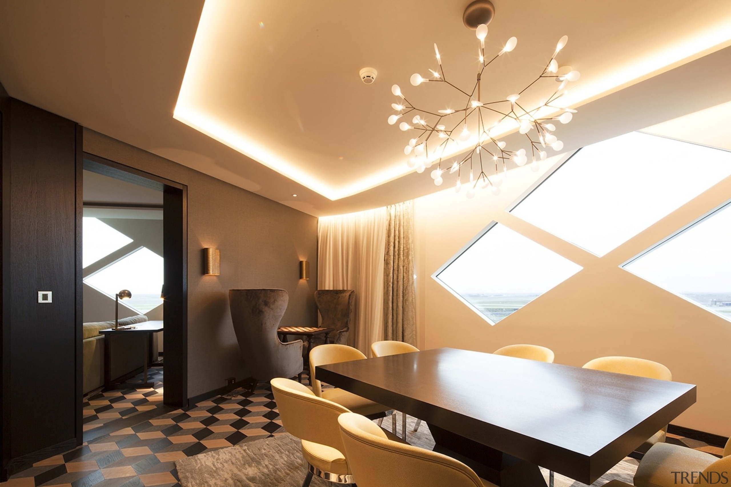 The window is certainly the eye-catching feature in ceiling, interior design, lighting, living room, room, wall, orange