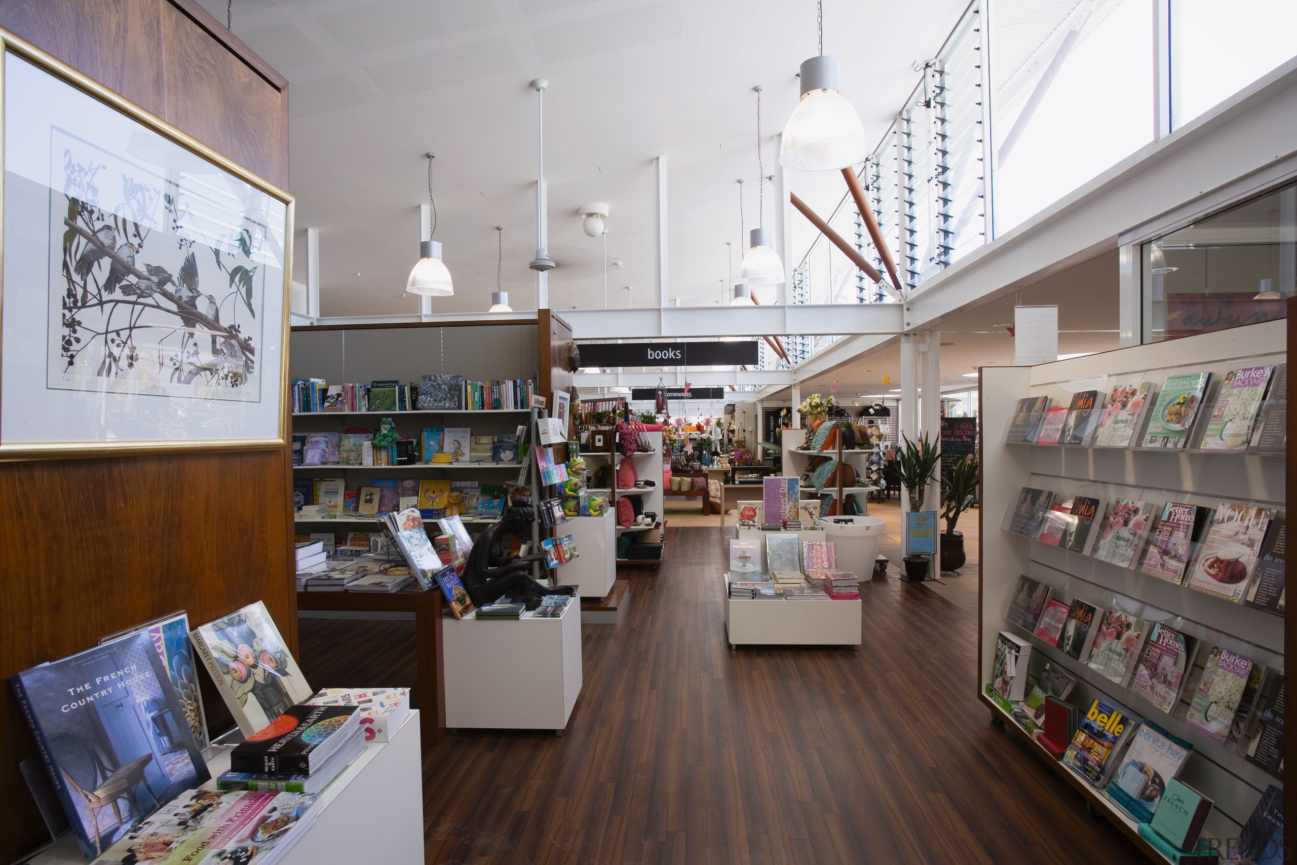 A view of the retail area. - A bookselling, exhibition, institution, interior design, library, public library, retail, gray