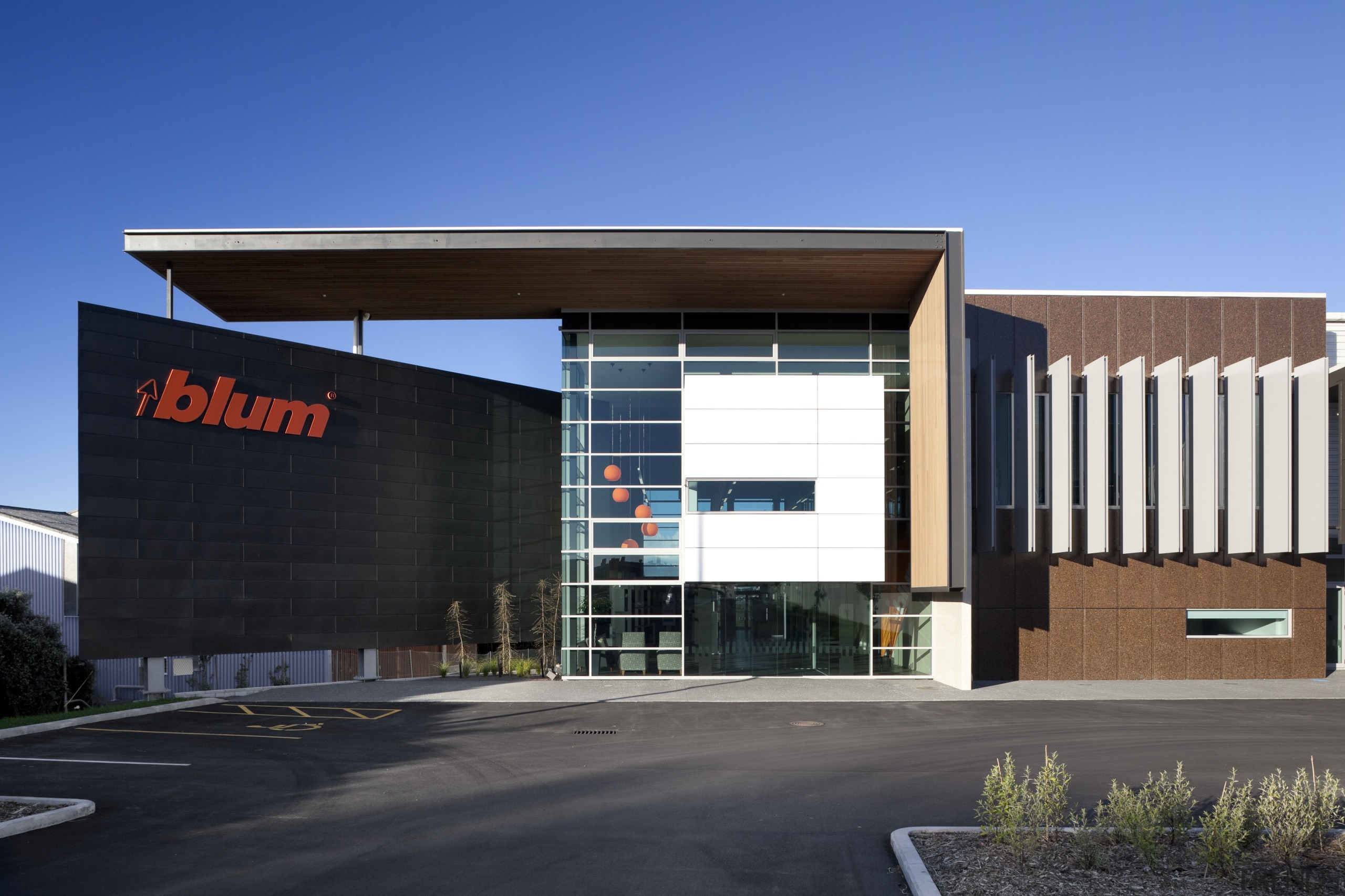 Exterior of Blum building. - Exterior of Blum architecture, building, commercial building, corporate headquarters, elevation, facade, headquarters, mixed use, property, real estate, black, teal