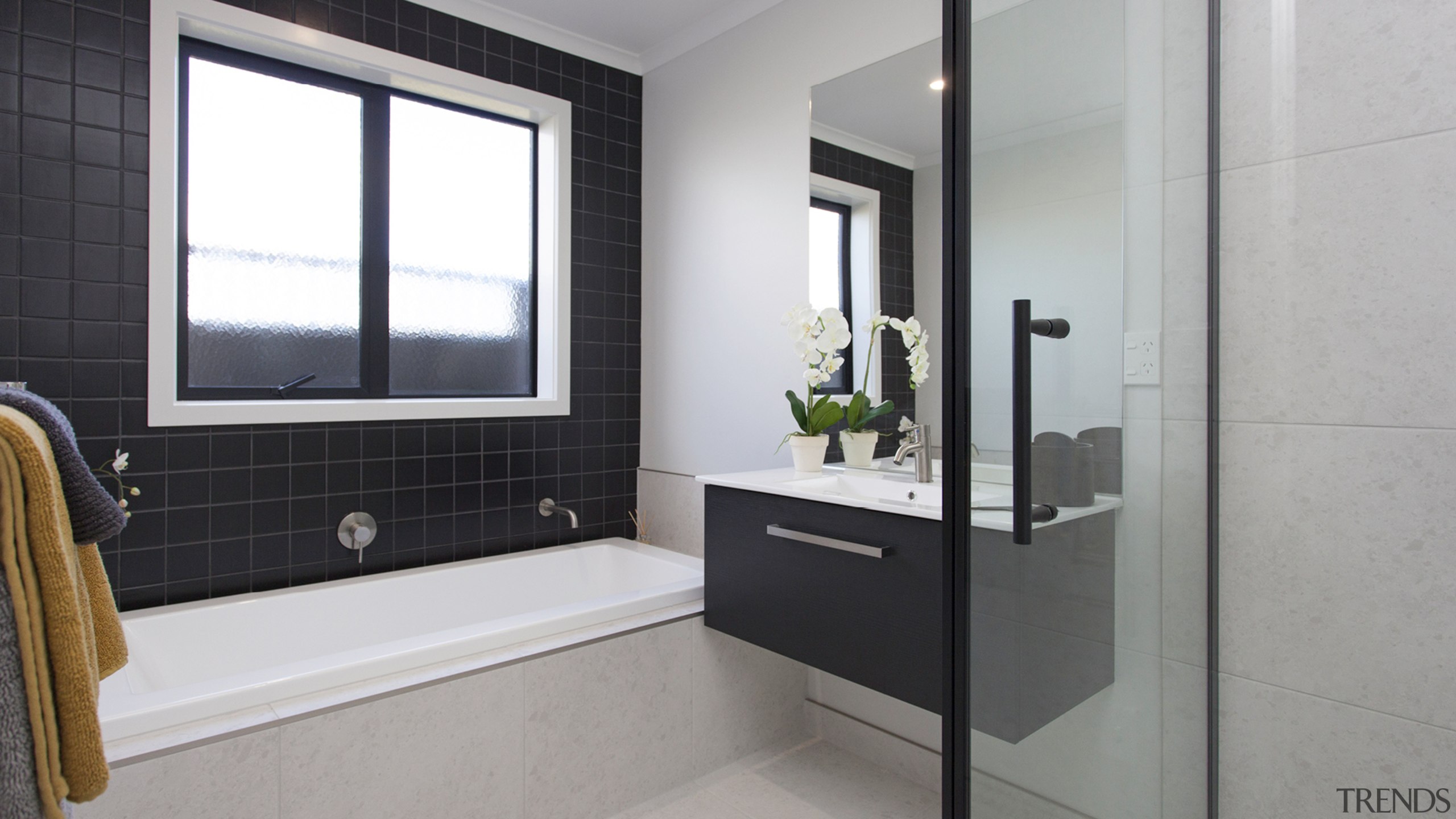 Black wall tiles add character to the main 