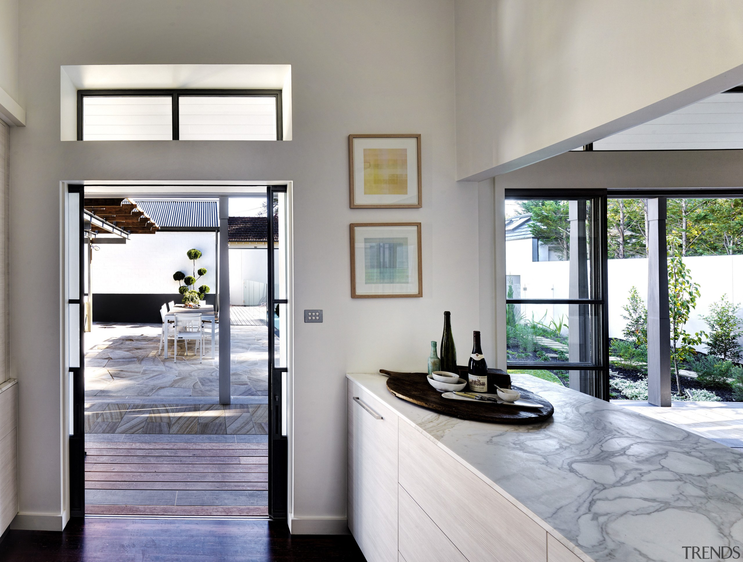 A servery connects the new kitchen to a door, home, house, interior design, real estate, window, gray, white