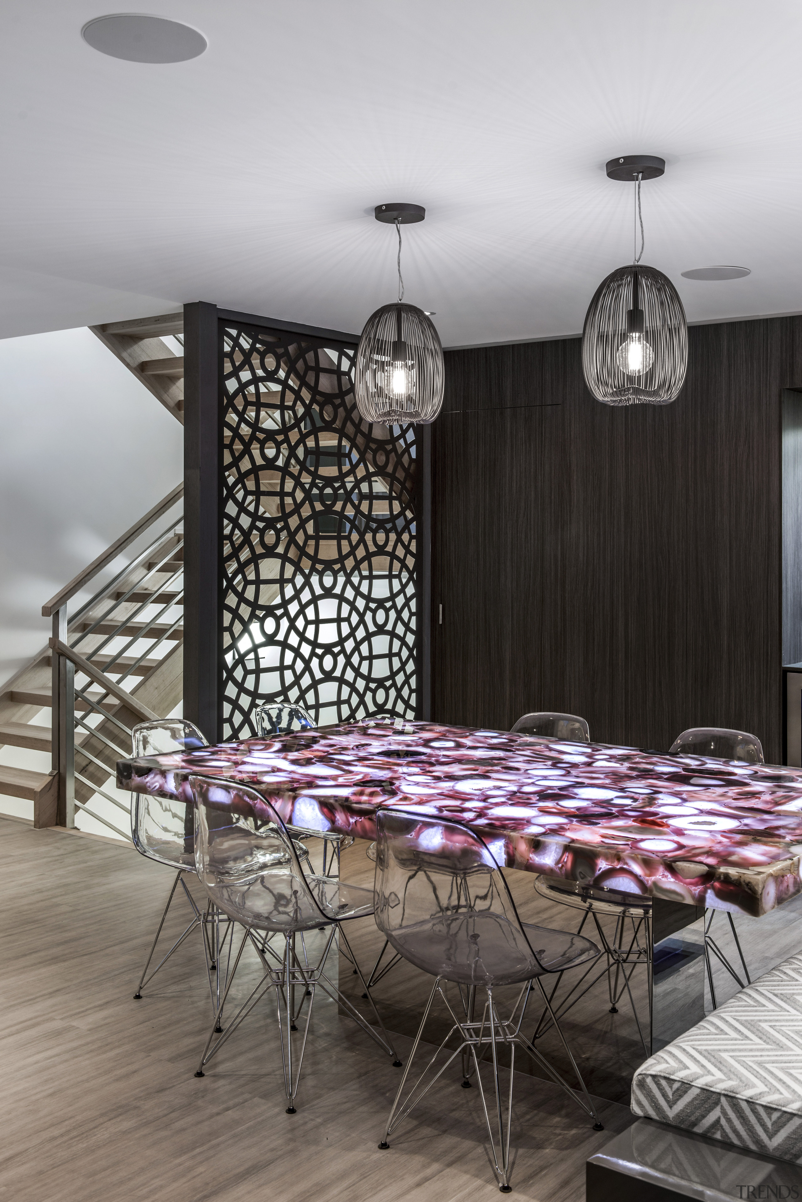 A polished stainless steel plinth supports this table, architecture, ceiling, dining room, furniture, interior design, light fixture, lighting, table, wall, gray, black