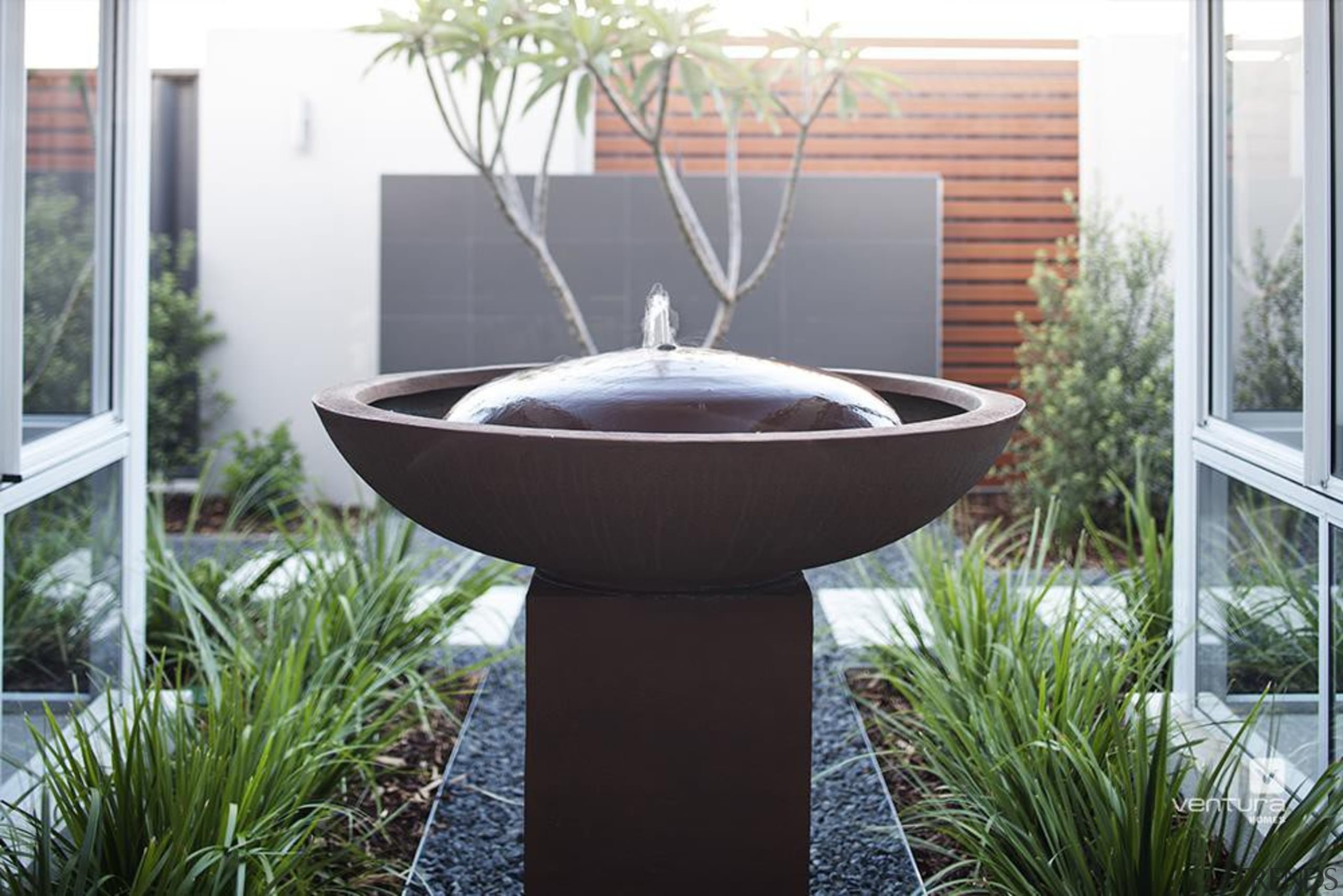 Make a statement with a water feature. - bird bath, flowerpot, water feature, white