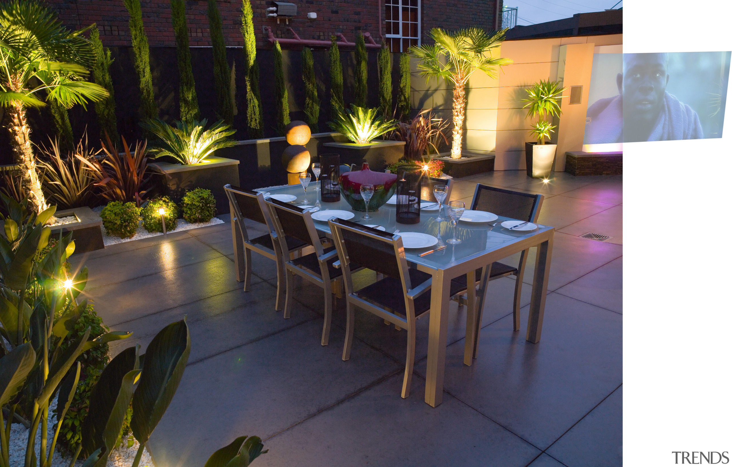 view of the outdoor dining area featuring alluminium backyard, furniture, interior design, lighting, patio, property, real estate, table, black