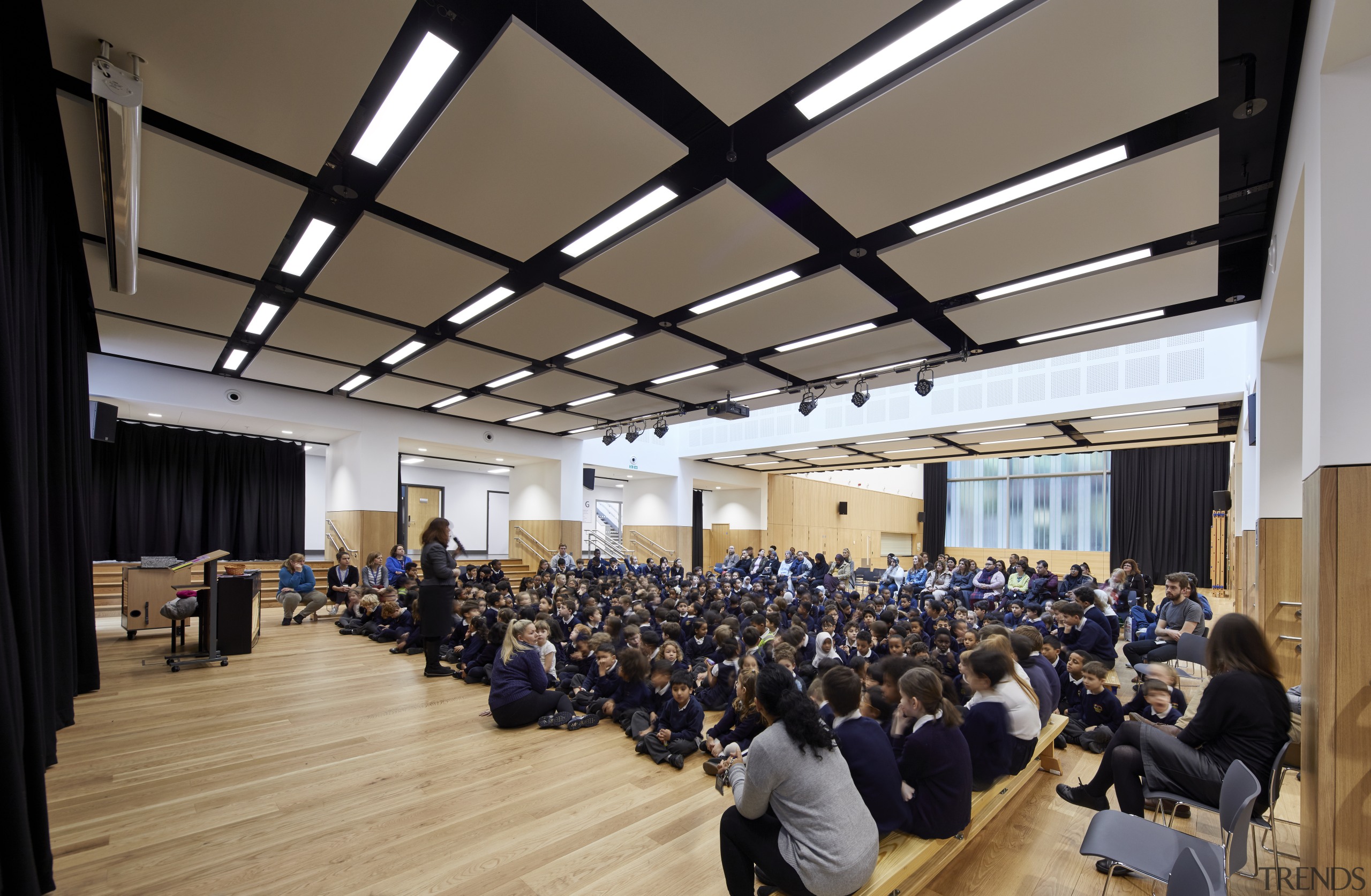 A retractable partition allows the main hall to gray, black