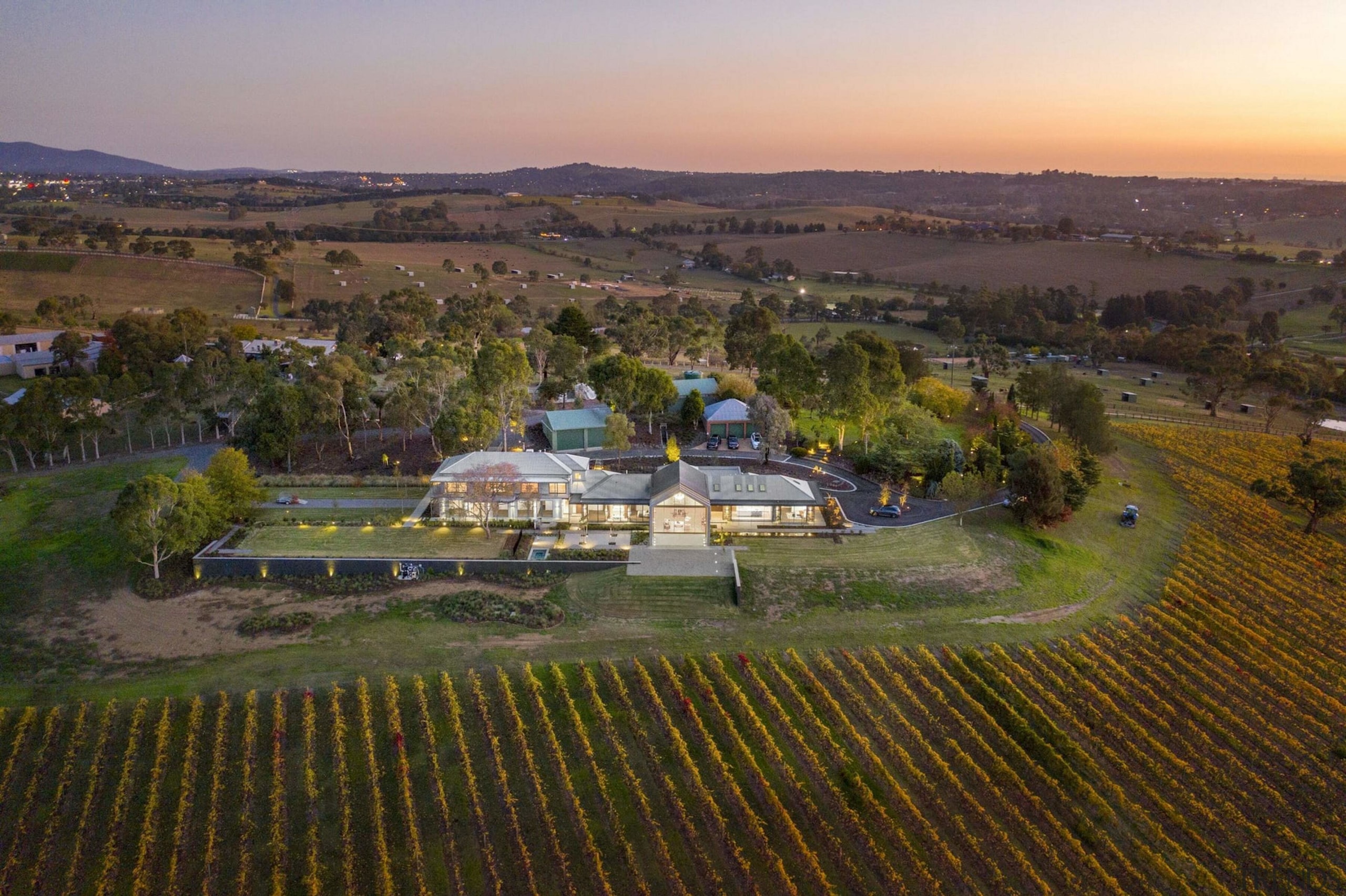 The home within its sprawling, verdant setting. 