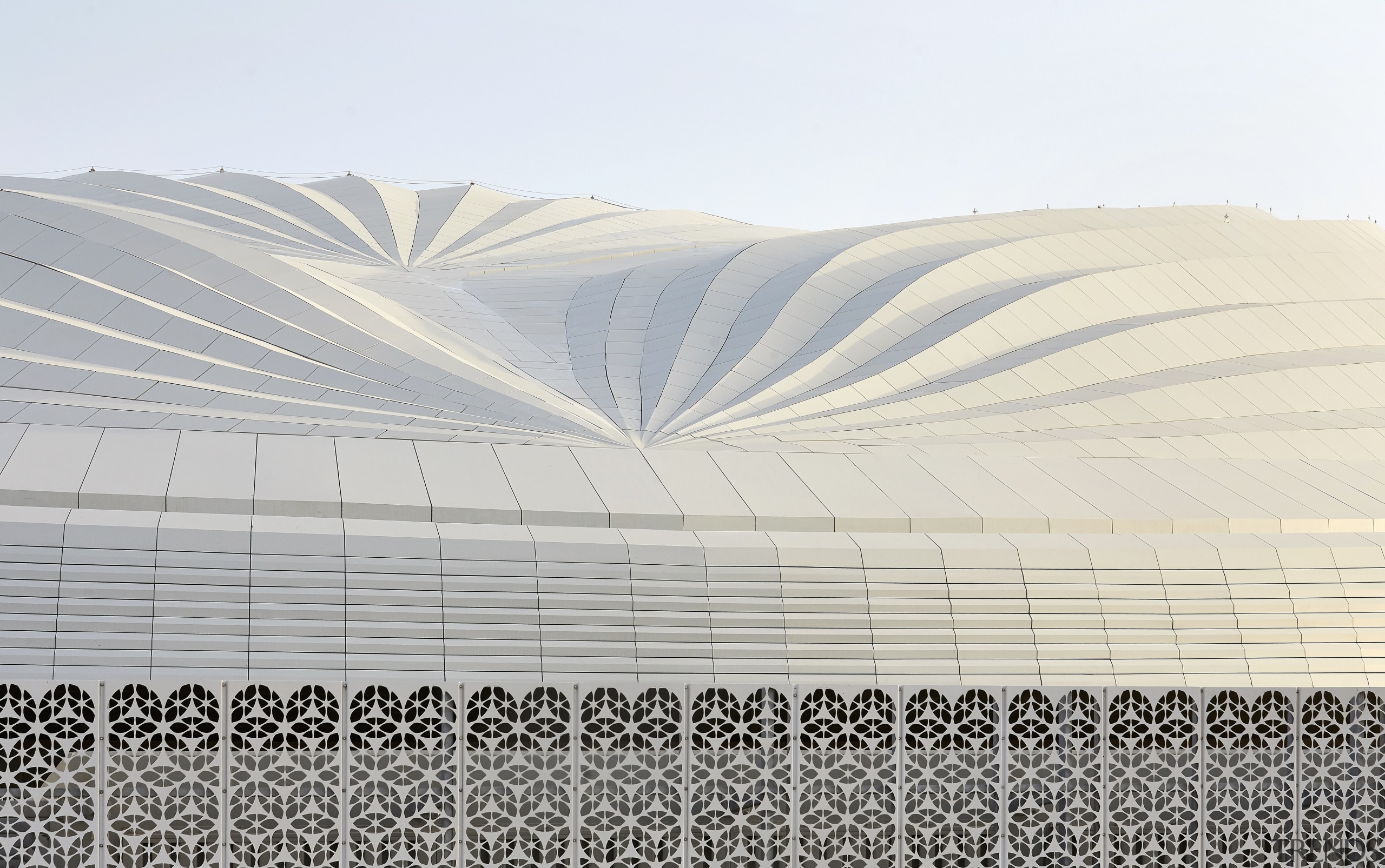 The stadium’s roof design is an abstraction of architecture, line, textile, white