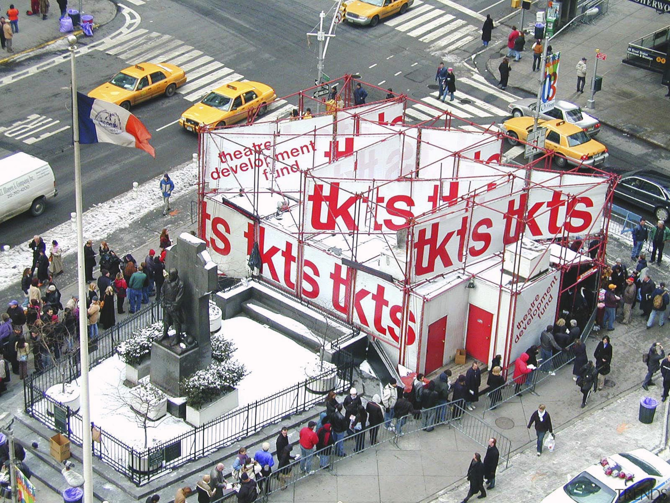 View of the new TKTS ticketing booth in city, crowd, white, gray