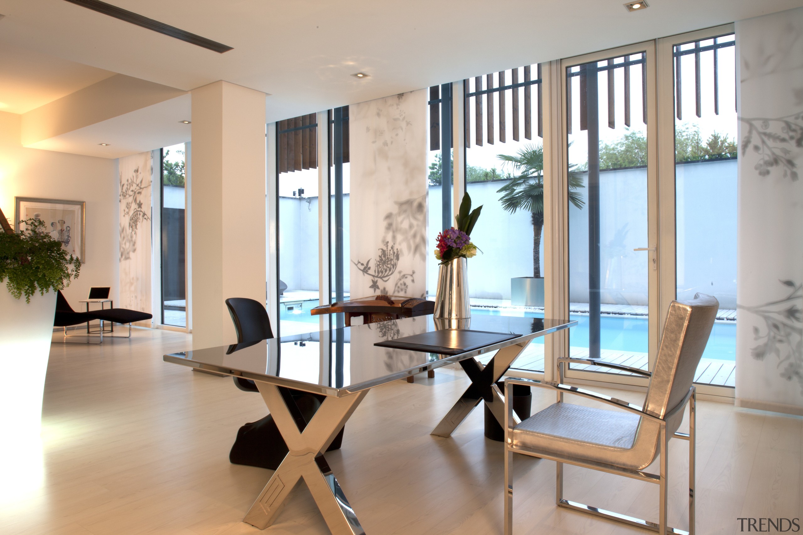 View of informal dining area with glass topped interior design, property, real estate, room, gray, orange