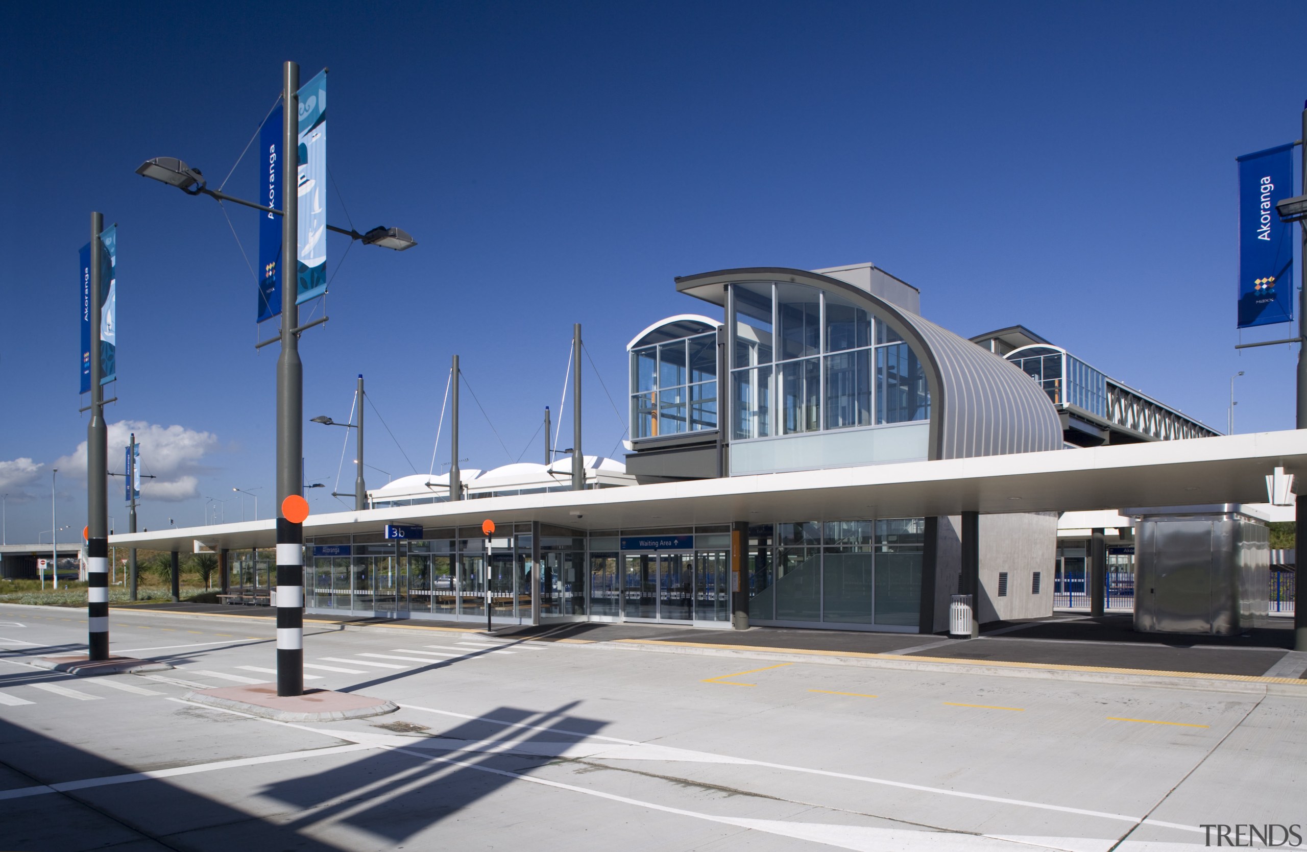 view of aluminium joinery designed and installed by airport, airport terminal, architecture, building, commercial building, corporate headquarters, fixed link, infrastructure, metropolis, metropolitan area, mixed use, sky, skyway, transport, blue, gray