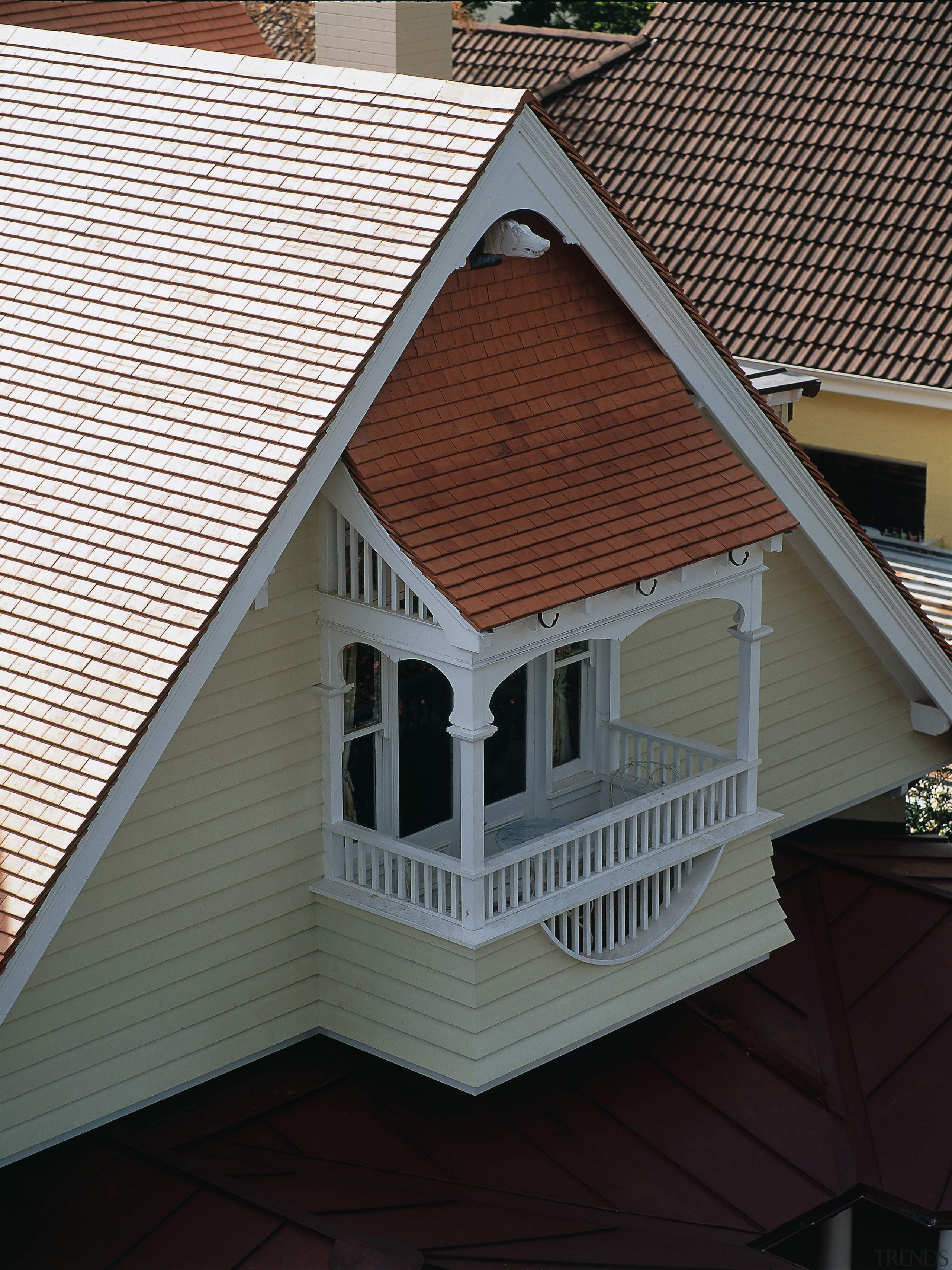 Terracotta roof shingles on steep roof, and on architecture, building, daylighting, facade, home, house, real estate, residential area, roof, siding, window, wood, black, gray