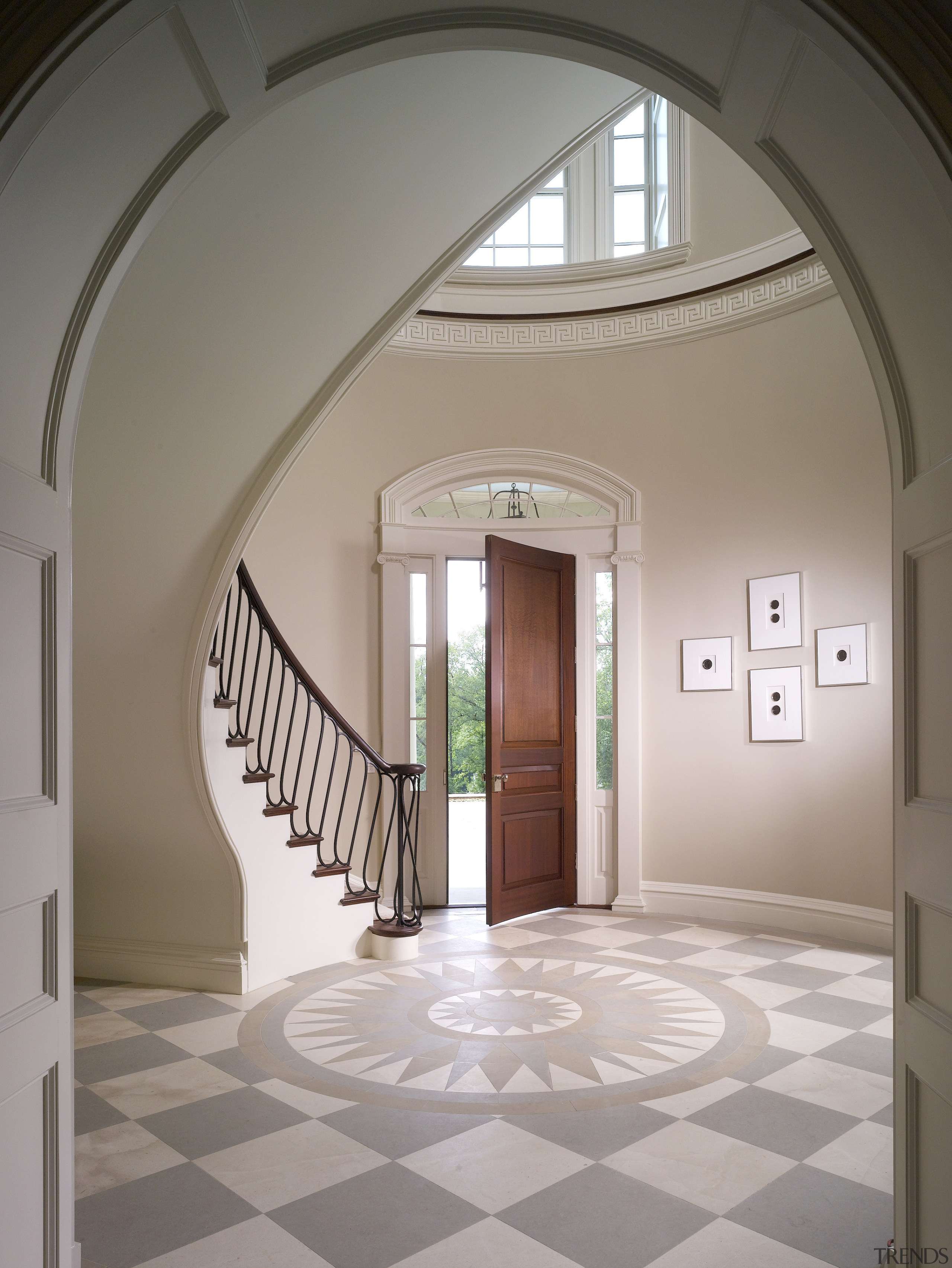 View of atrium of this Regency-styled home with arch, architecture, ceiling, daylighting, estate, floor, flooring, home, interior design, molding, real estate, stairs, structure, window, gray