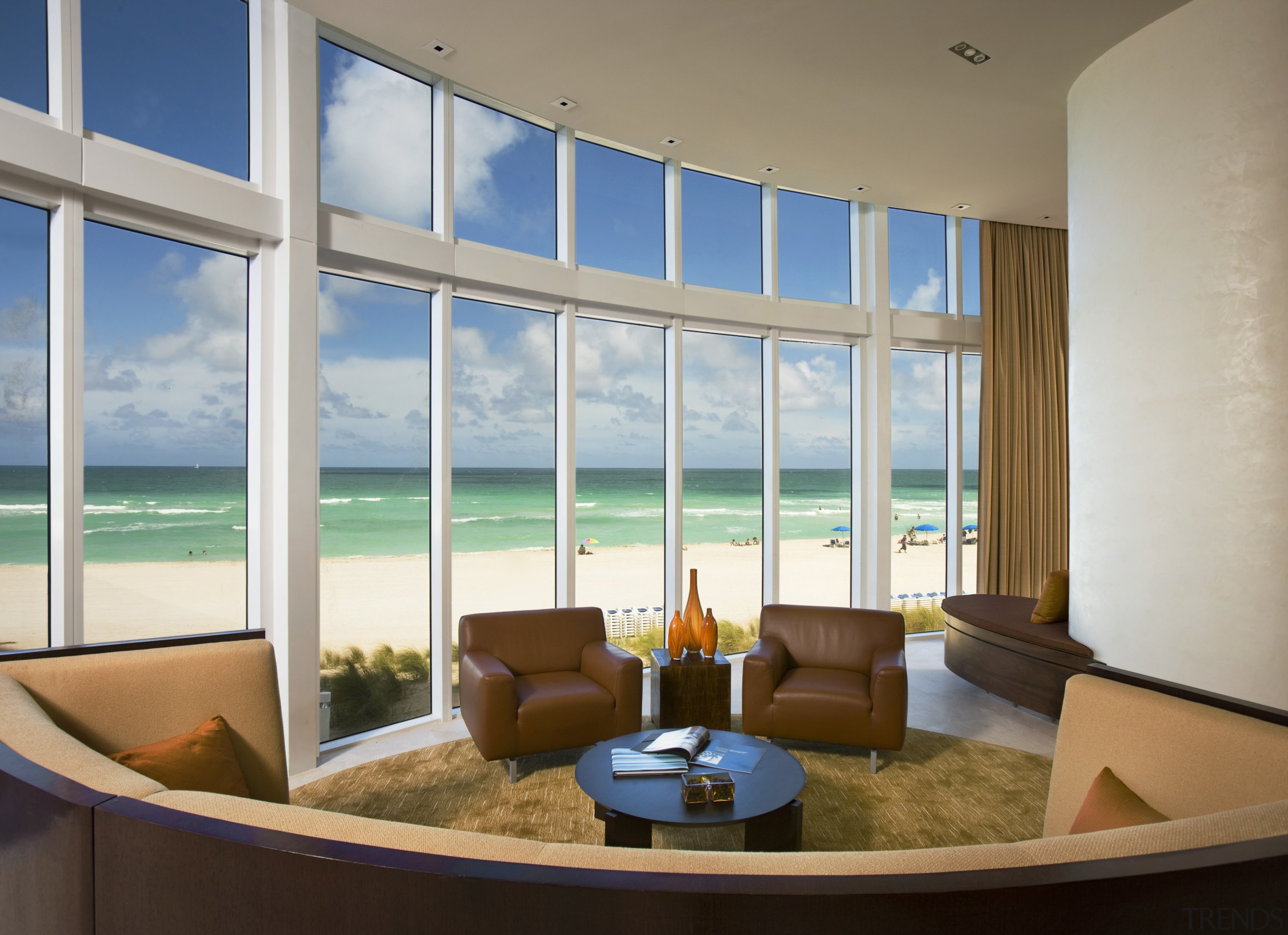 View of living area with sofas and leather condominium, daylighting, interior design, living room, penthouse apartment, real estate, window, gray, brown