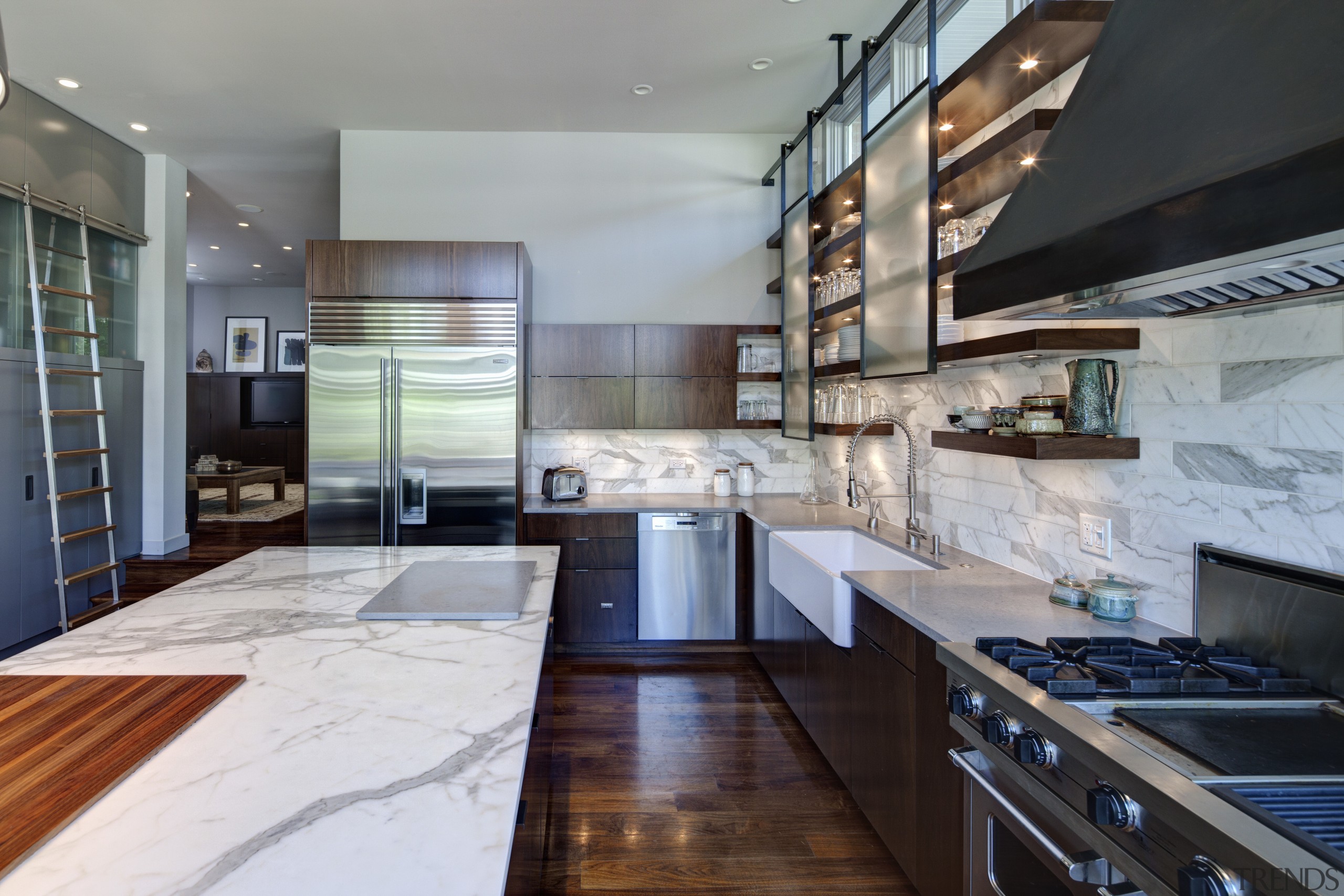 A black steel hood contrasts white calacatta marble cabinetry, countertop, cuisine classique, interior design, kitchen, gray, black