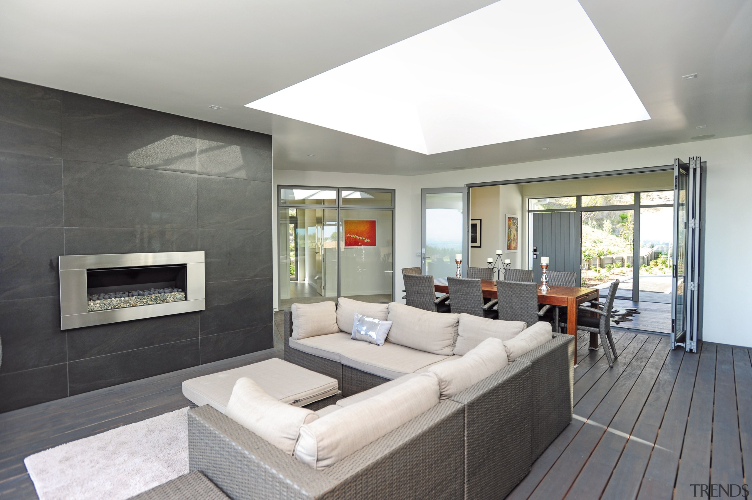 This new home by GJ Gardner Homes features architecture, ceiling, floor, house, interior design, living room, real estate, room, window, gray, white