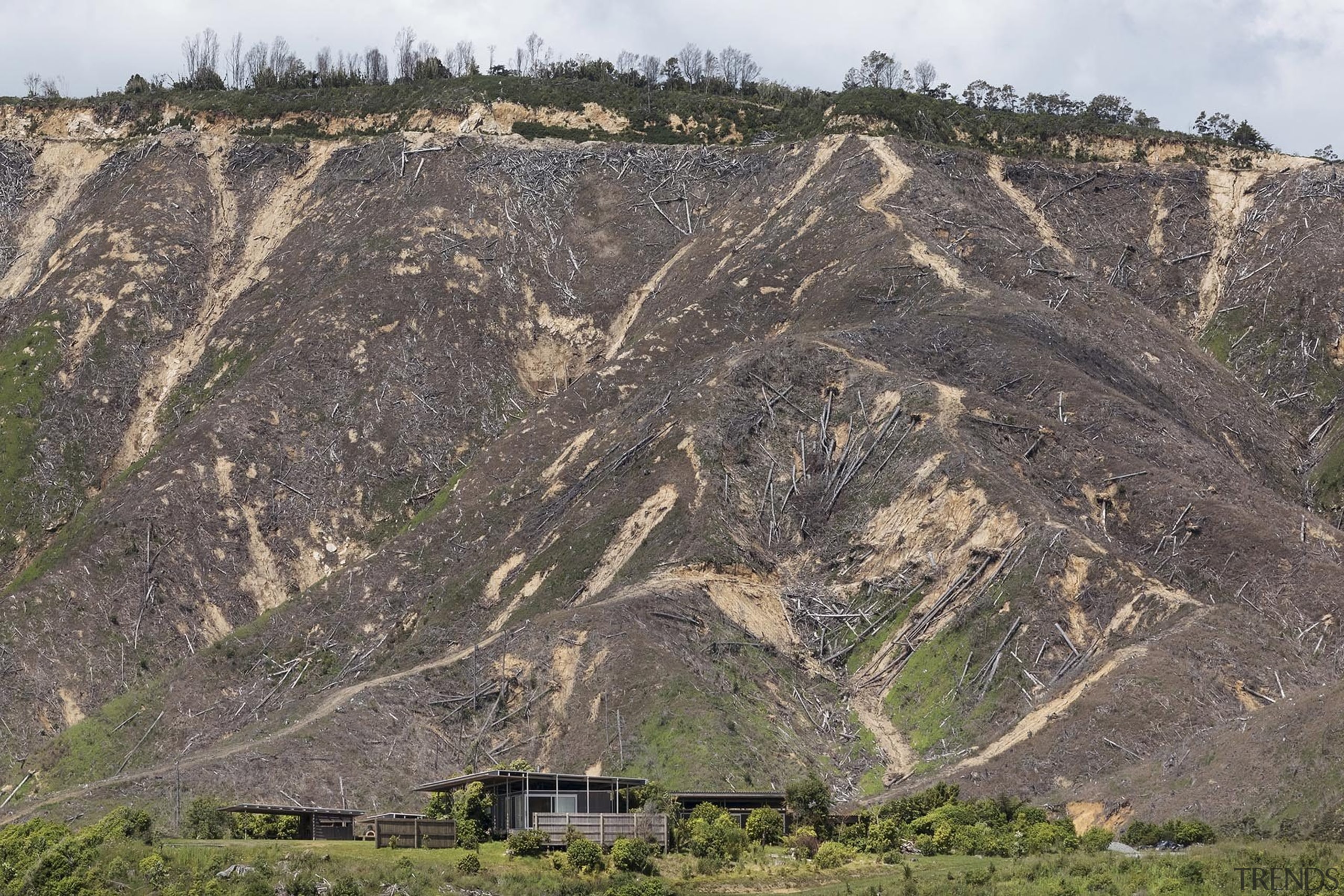 Housing– Alterations And Additions: Bach With Two Roofs badlands, escarpment, geological phenomenon, geology, highland, hill, mountain, mountain pass, outcrop, rock, shrubland, sill, sky, gray