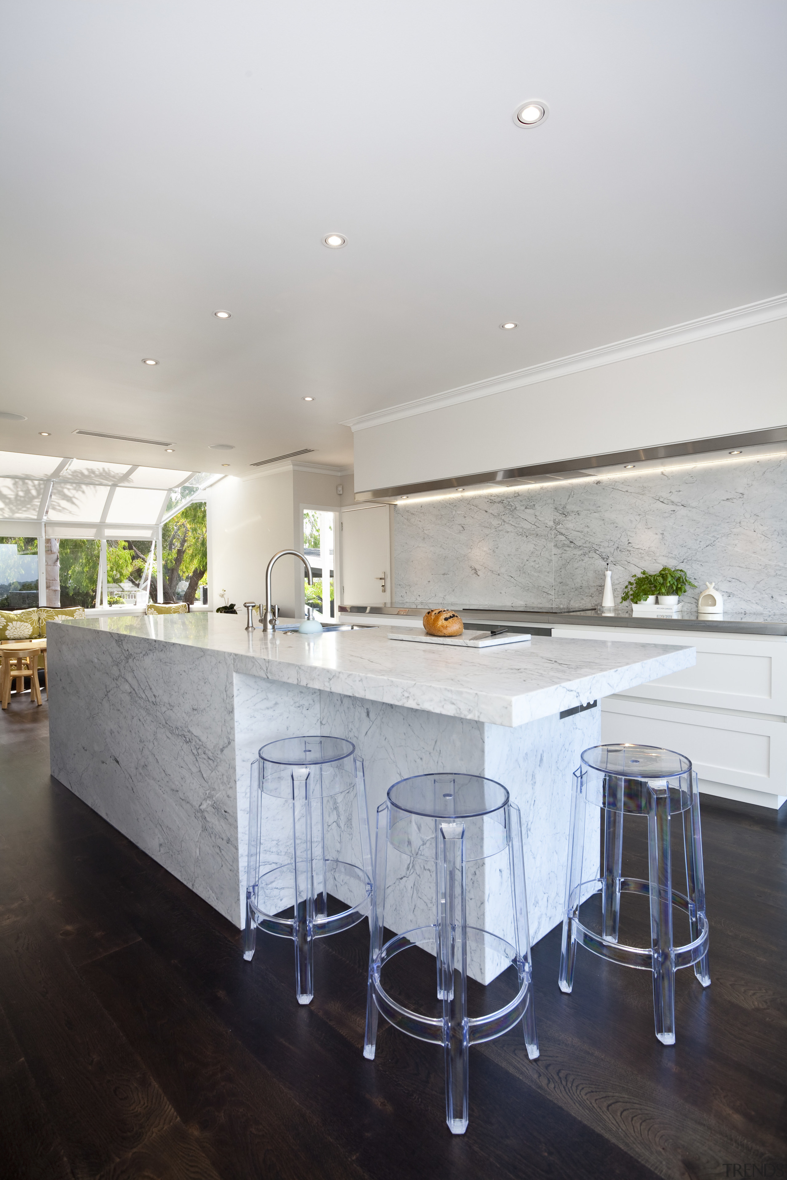 Carrara marble is used to create a centerpiece architecture, ceiling, countertop, floor, home, house, interior design, kitchen, real estate, room, table, gray, white