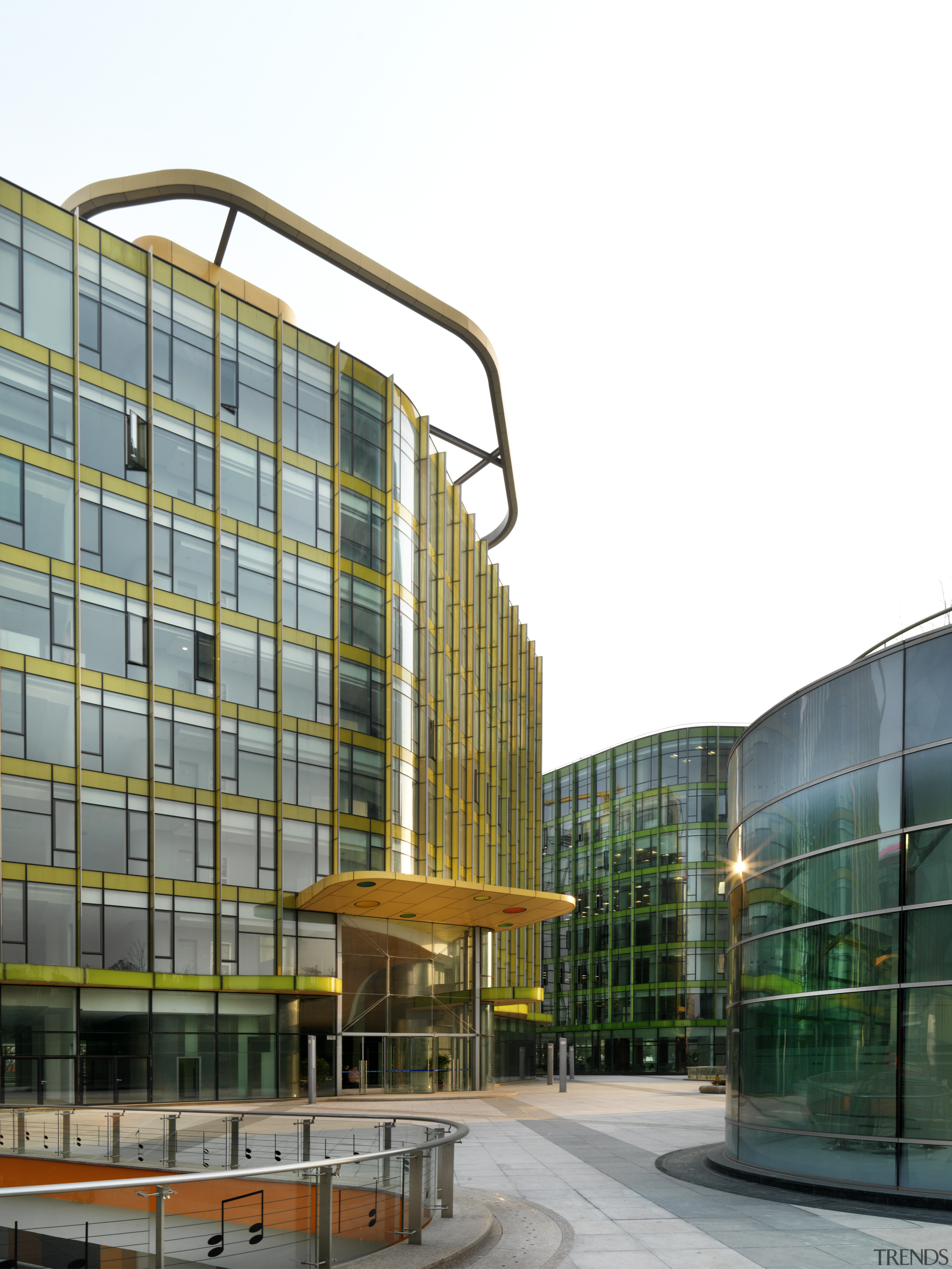 View of the Shanghai International Cruise Terminal. apartment, architecture, building, commercial building, condominium, corporate headquarters, facade, headquarters, house, metropolitan area, mixed use, neighbourhood, residential area, tower block, urban design, white