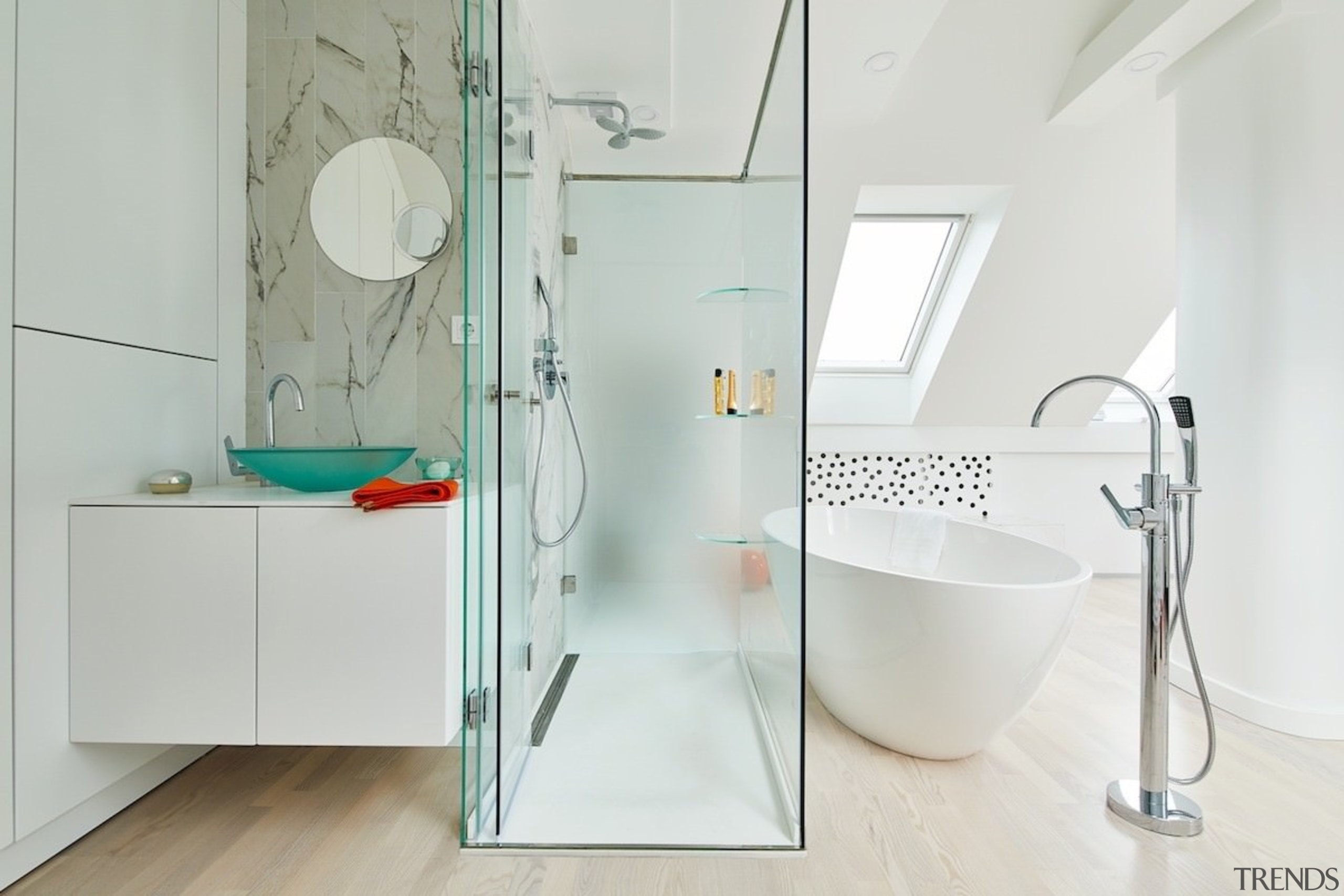 The shower divides the bathtub and floating vanity angle, bathroom, interior design, plumbing fixture, product design, room, tap, white