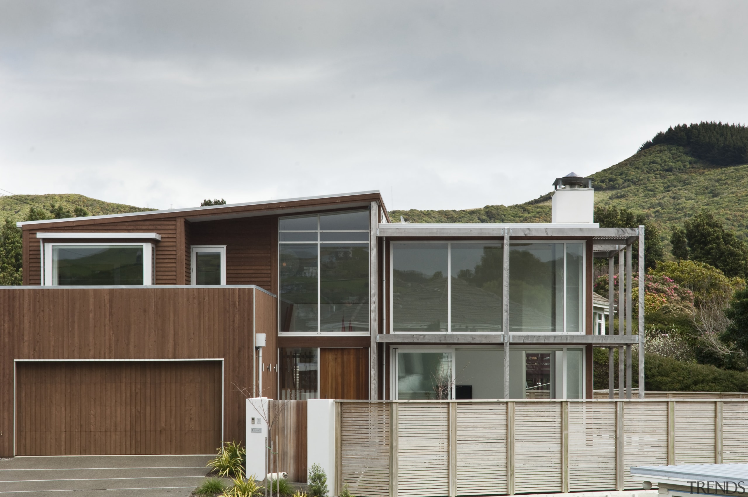 Exterior view of contemporary home. - Exterior view architecture, cottage, elevation, facade, home, house, property, real estate, residential area, white, brown