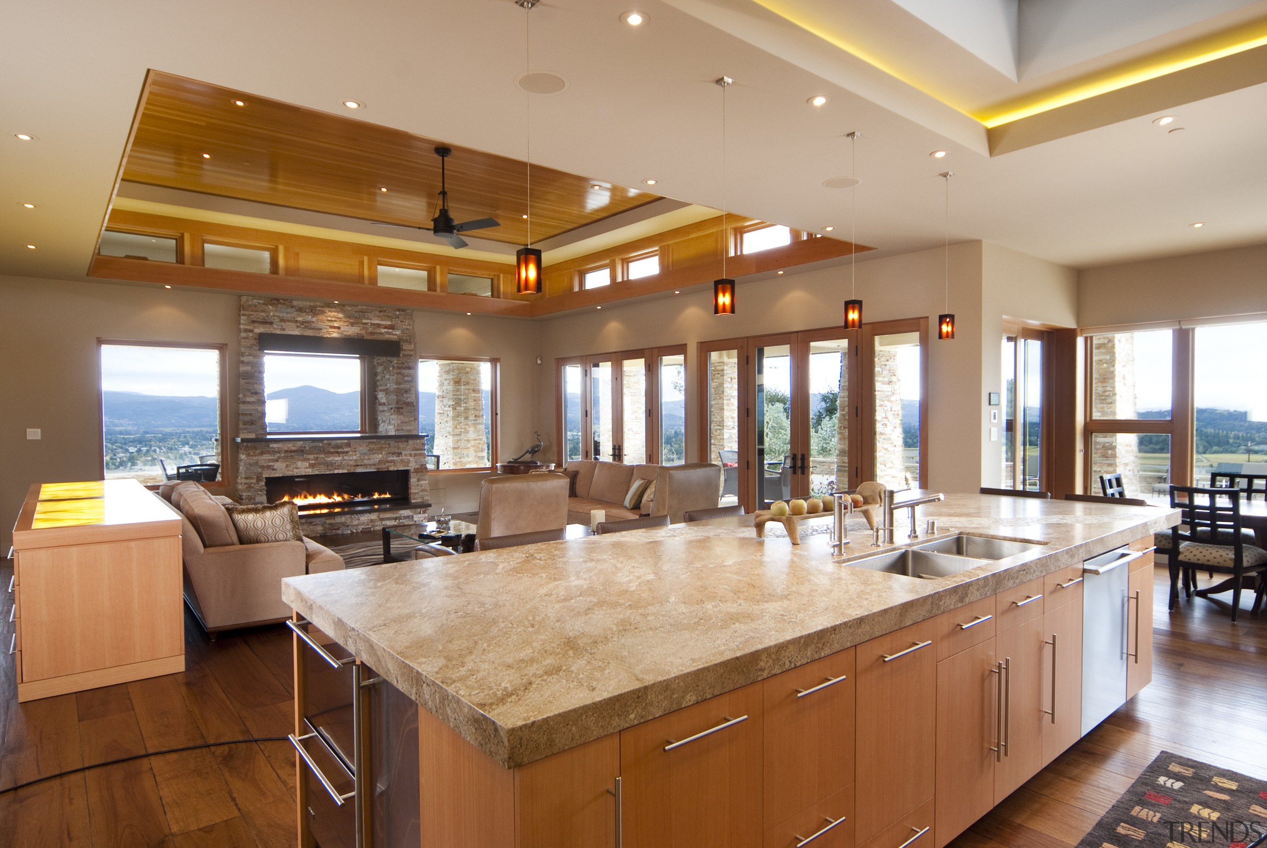 View of kitchen with wooden flooring, stone wall ceiling, countertop, estate, interior design, kitchen, real estate, brown, orange