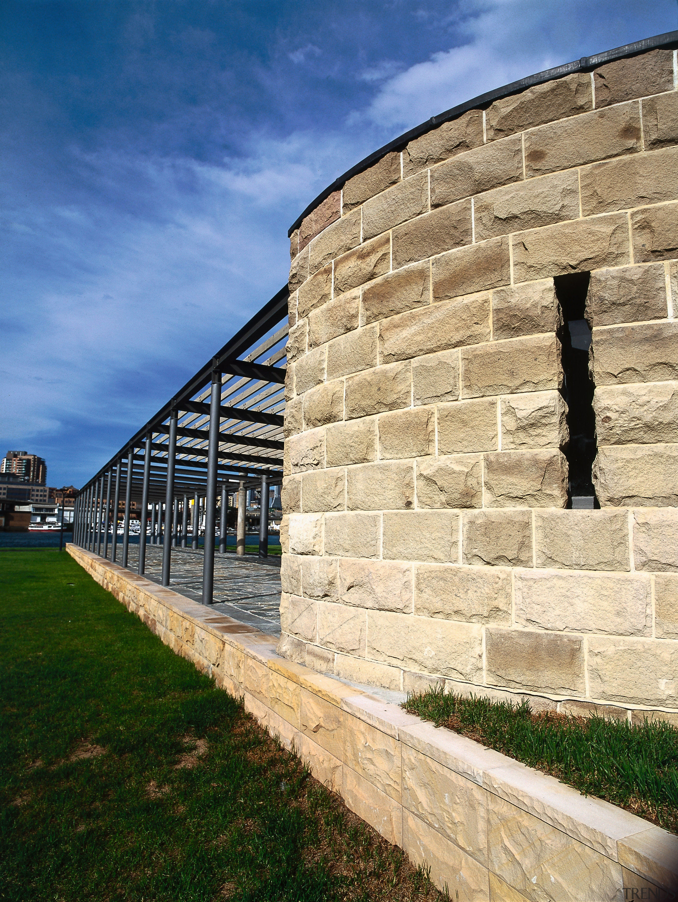An exterior view of the exteriror building materials architecture, building, facade, sky, structure, wall, orange