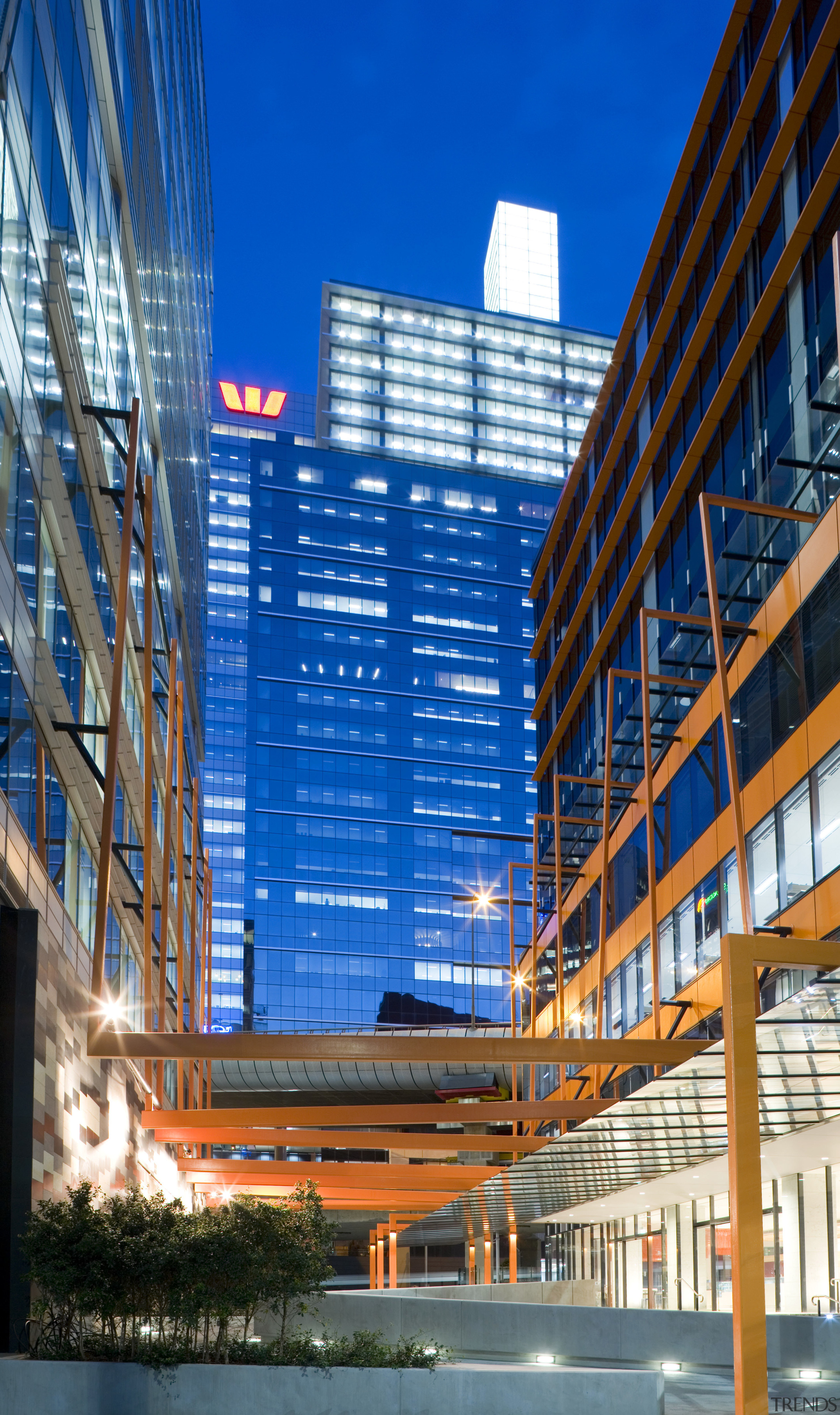 The building foyer opens onto a through-site link architecture, building, city, cityscape, commercial building, condominium, corporate headquarters, daytime, downtown, facade, headquarters, hotel, landmark, metropolis, metropolitan area, mixed use, real estate, reflection, residential area, sky, skyscraper, structure, tower block, urban area, blue