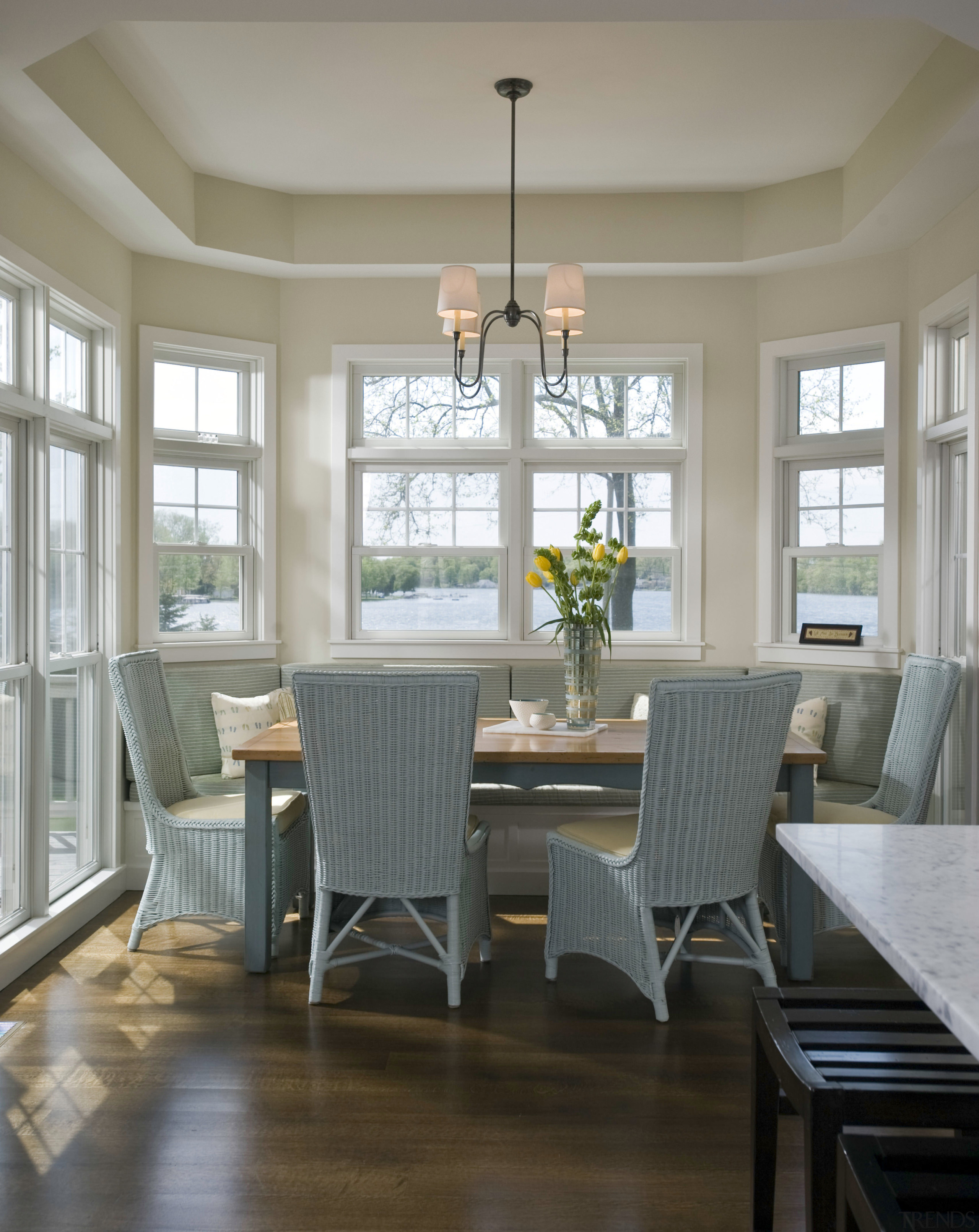 View of casual dining area incorporating a window cabinetry, ceiling, chair, dining room, floor, flooring, furniture, hardwood, home, interior design, living room, room, table, wall, window, wood, wood flooring, gray