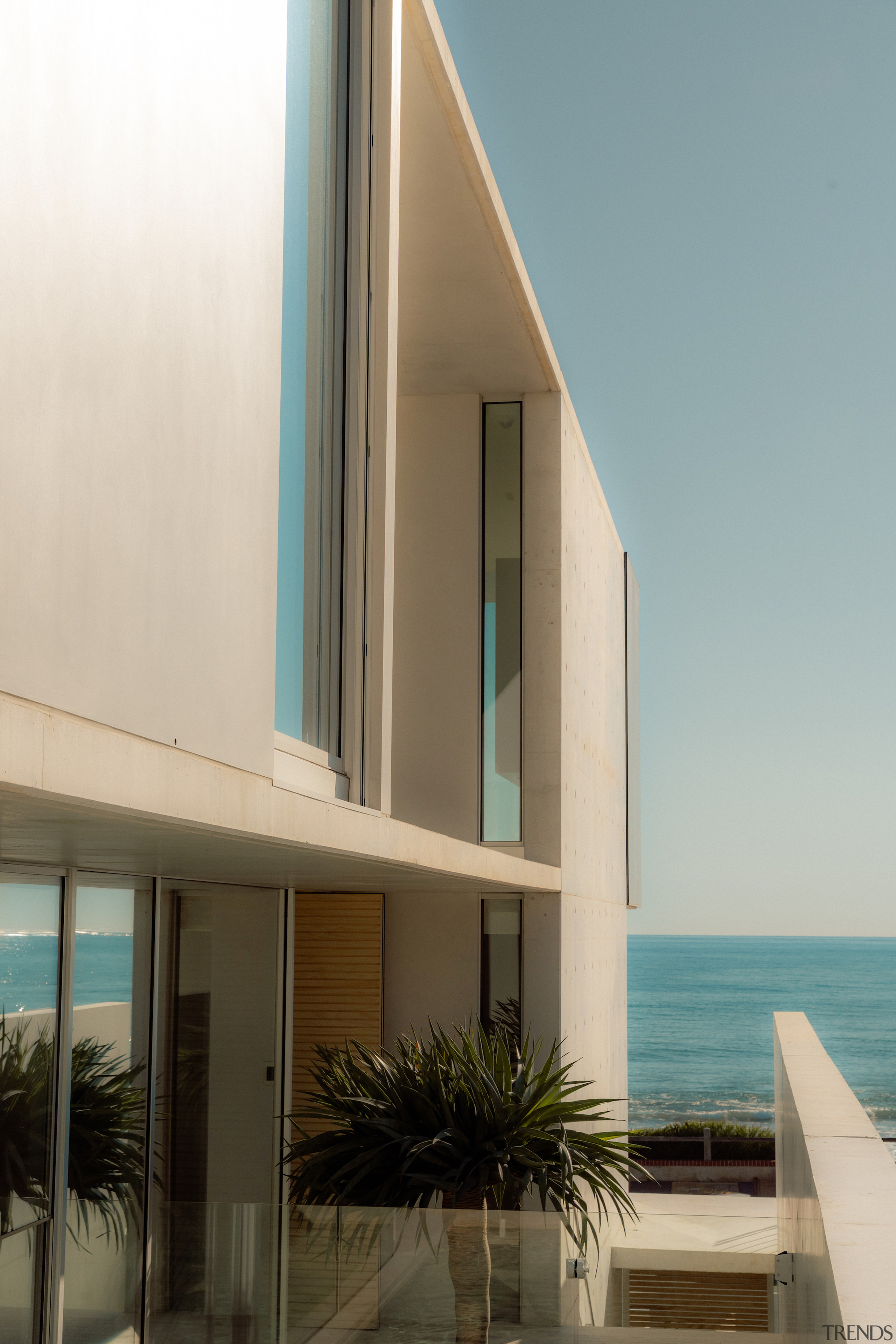 Looking along the side of the contemporary home. 