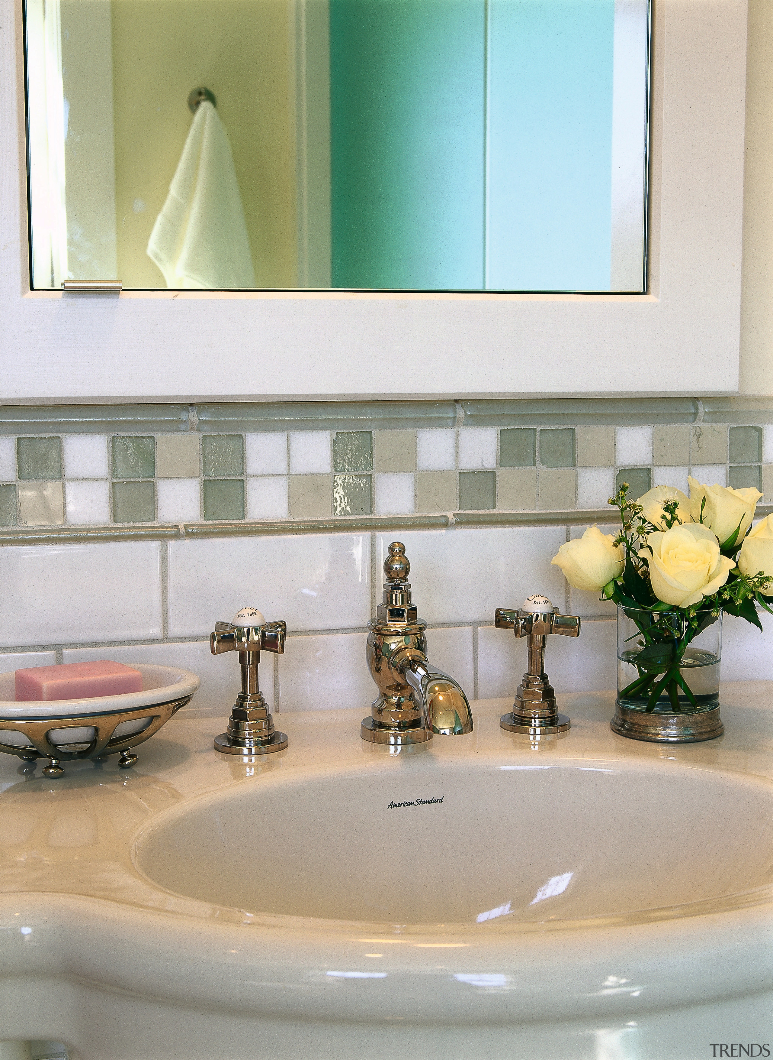 view of this bathroom featuring freestanding kohler bathtub, bathroom, ceramic, flooring, interior design, plumbing fixture, room, sink, tap, tile, gray
