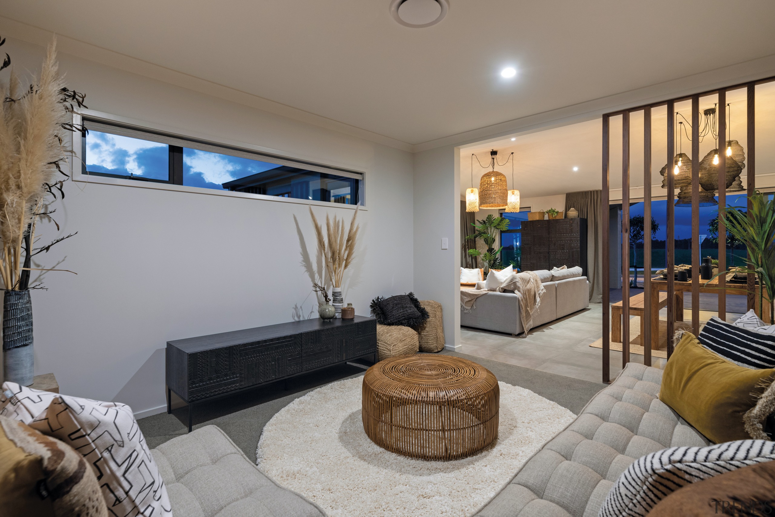 ​​​​​​​This Papamoa showhome’s lounge or media room is gray