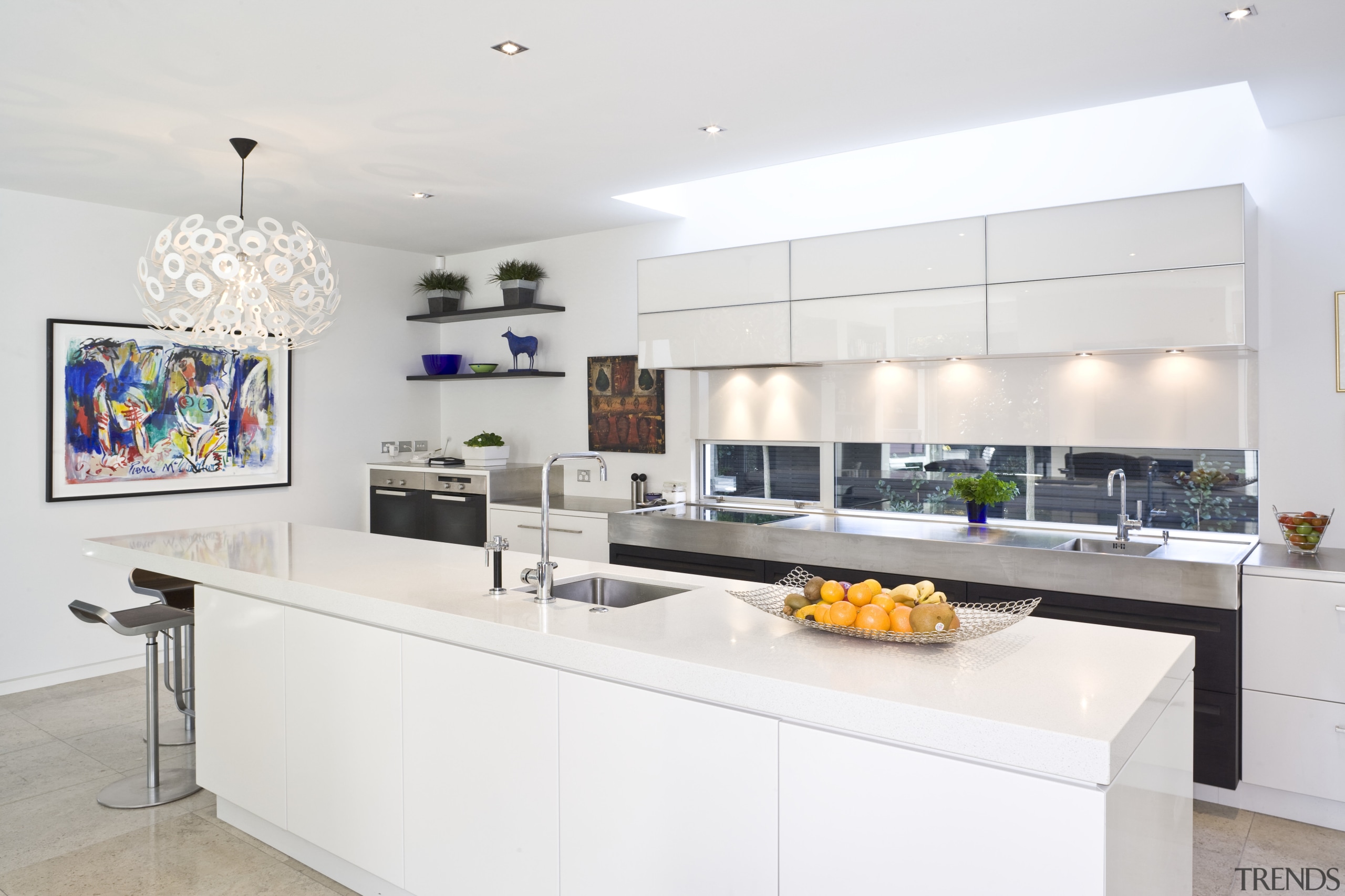 View of the kitchen area featuring sunburst light countertop, interior design, kitchen, product, real estate, white