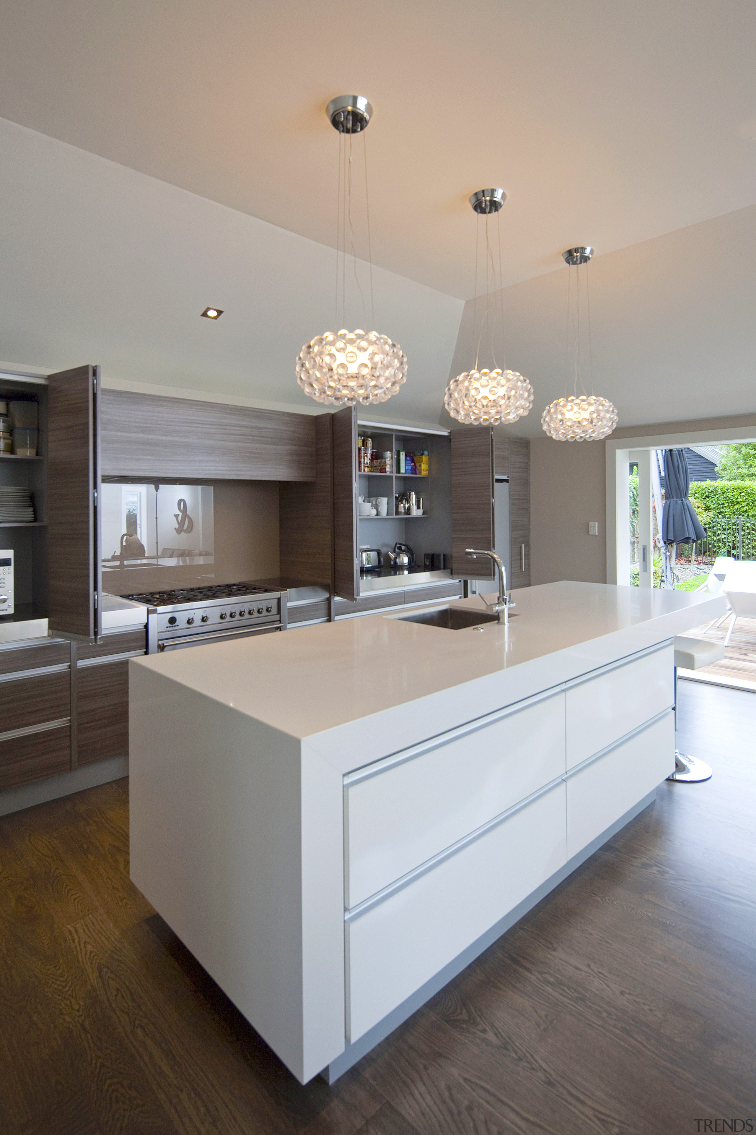 View of a kitchen which features white CeasarStone architecture, cabinetry, ceiling, countertop, cuisine classique, floor, hardwood, home, interior design, kitchen, real estate, room, table, gray