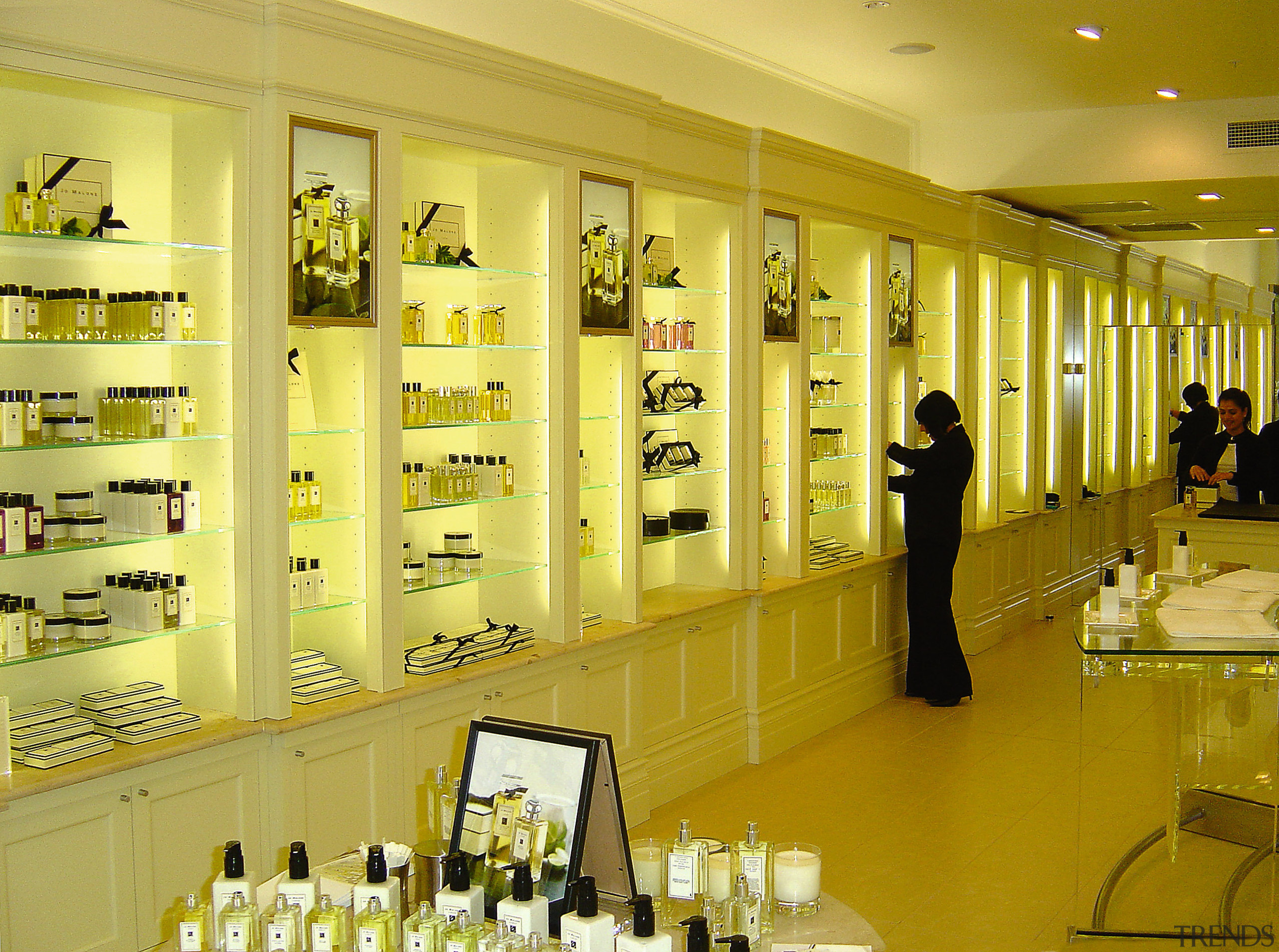 A view of a shop fit out by display window, function hall, interior design, yellow, yellow, brown