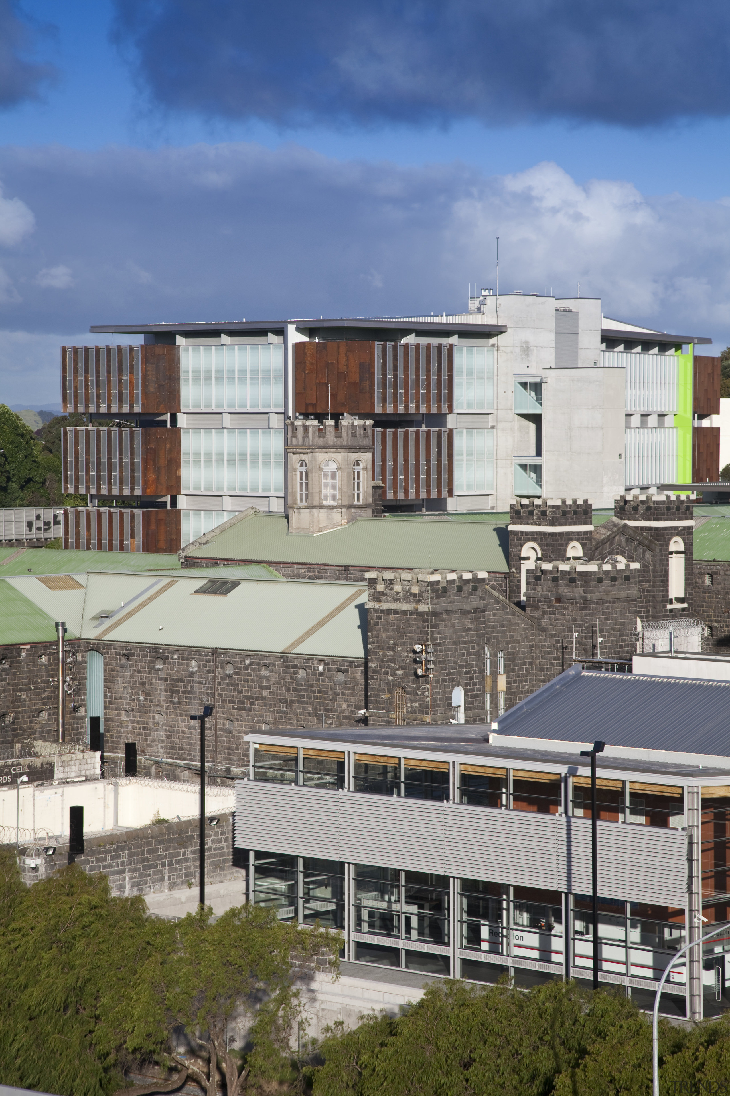 View of the Mt Eden Corrections Facility. - apartment, architecture, building, city, commercial building, condominium, corporate headquarters, elevation, facade, home, house, mixed use, neighbourhood, real estate, residential area, roof, sky, suburb, urban area, gray