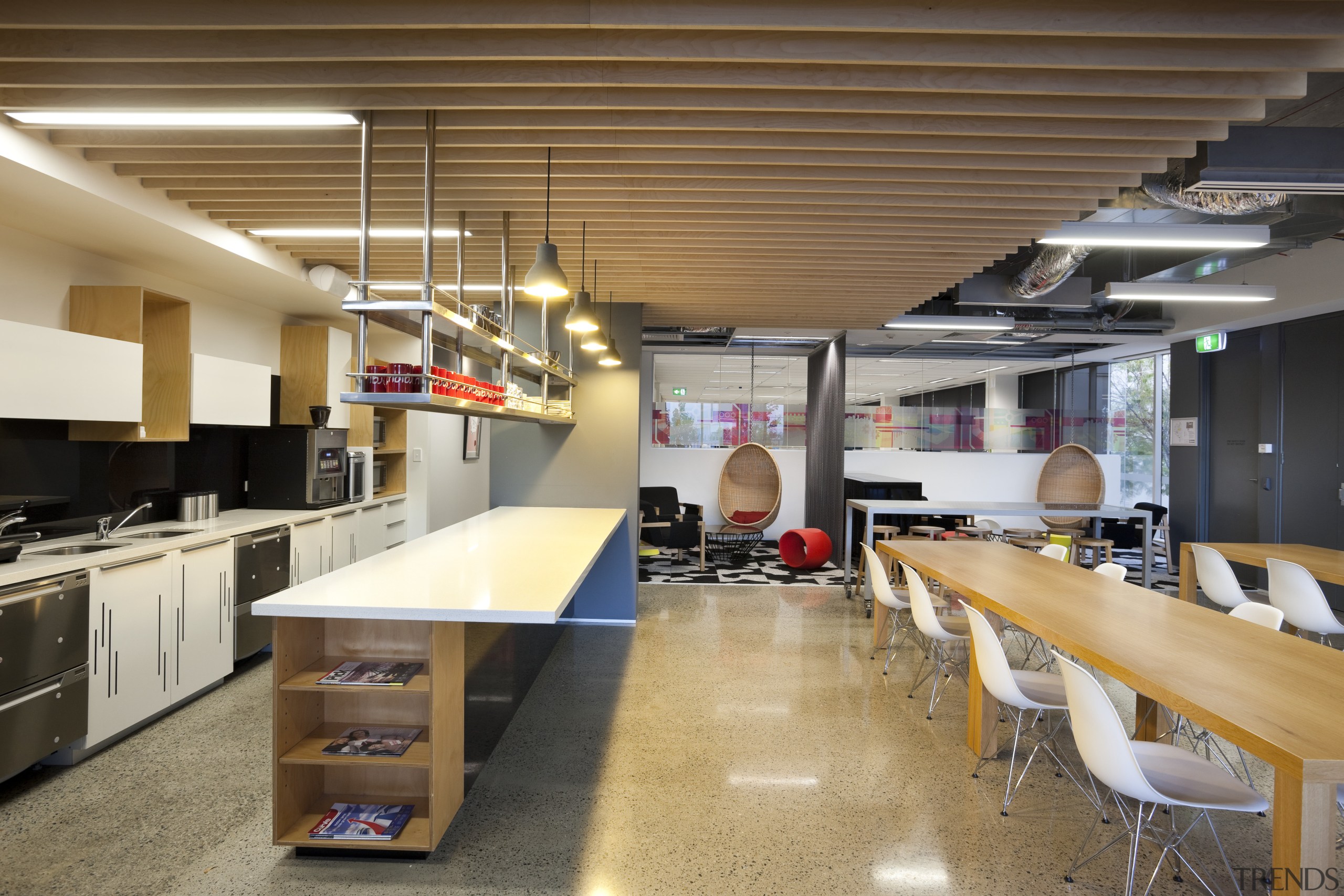 View of kitchen area with wooden table and interior design, brown