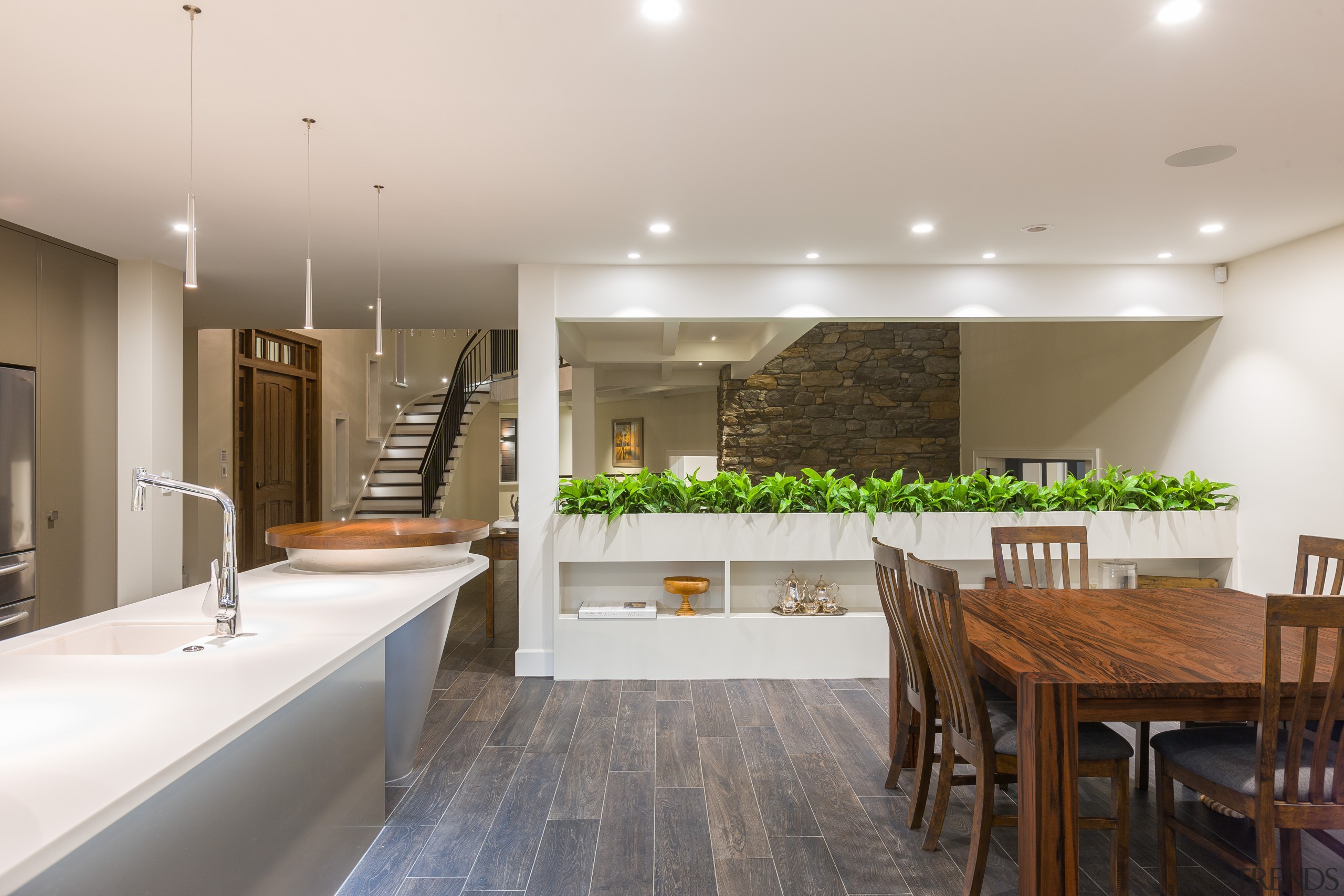 Plants on a low dividing wall add a ceiling, countertop, interior design, kitchen, real estate, room, gray, brown