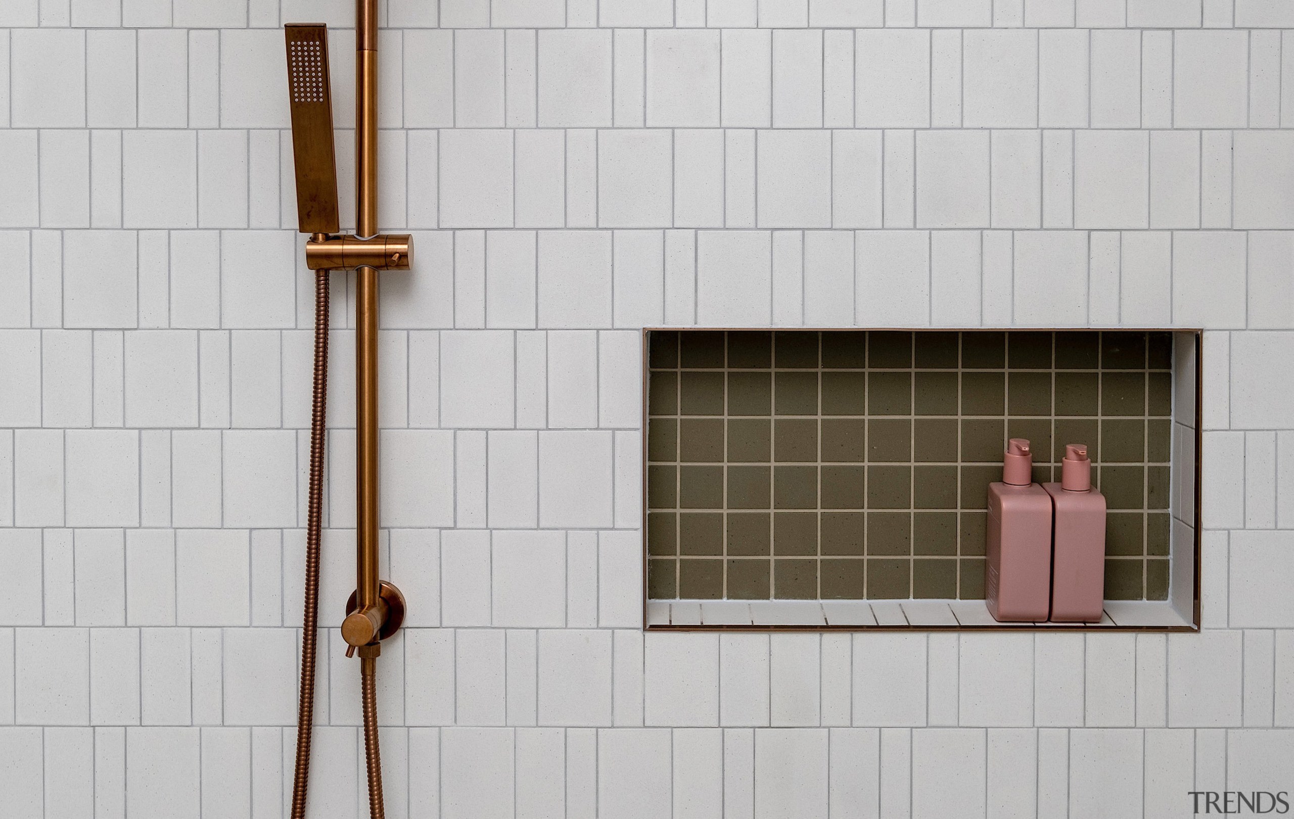 The shower hardware matches the vanity tapware for 