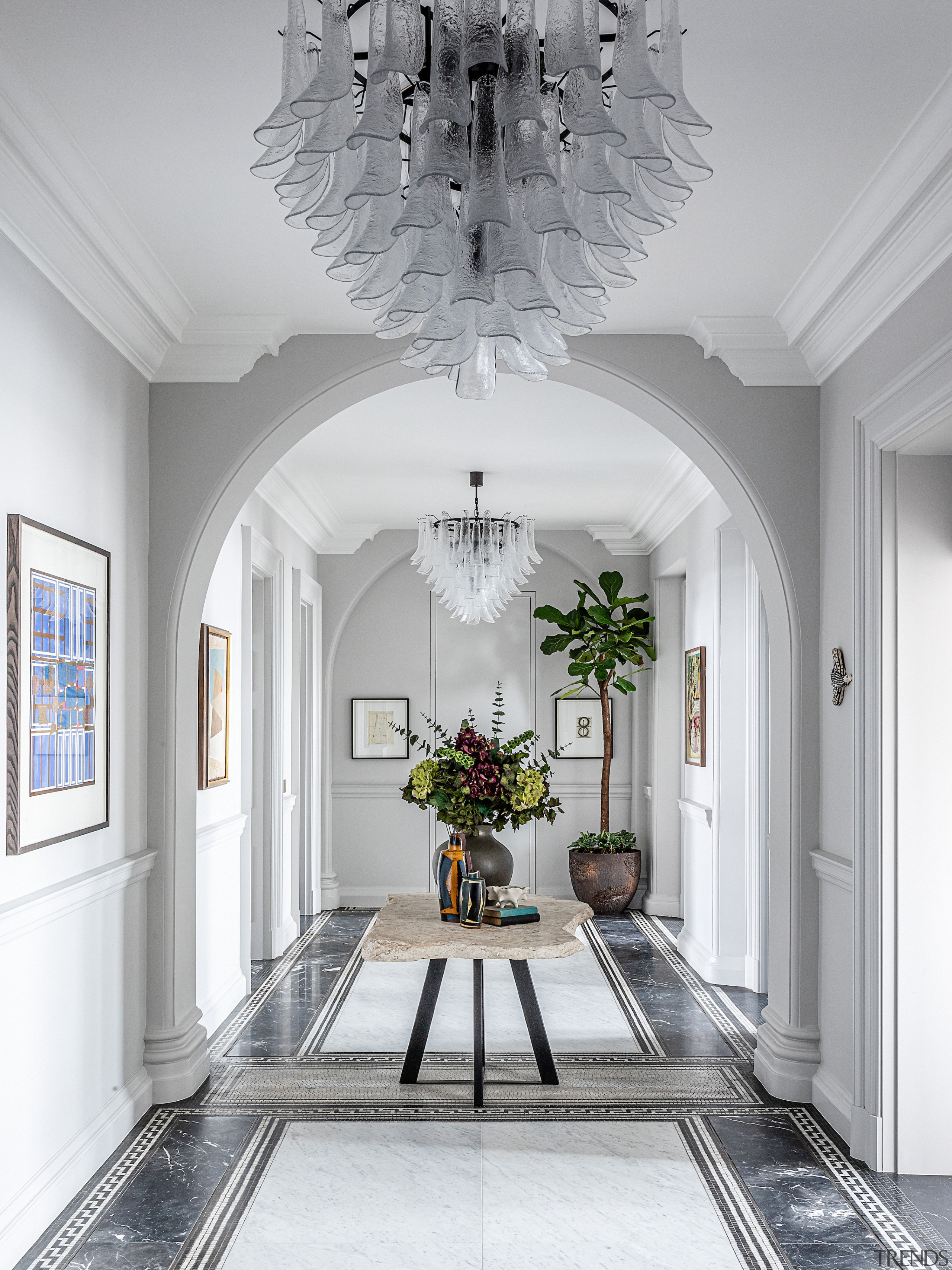 Entry hall – the spectacular custom-made Petali Chandeliers 