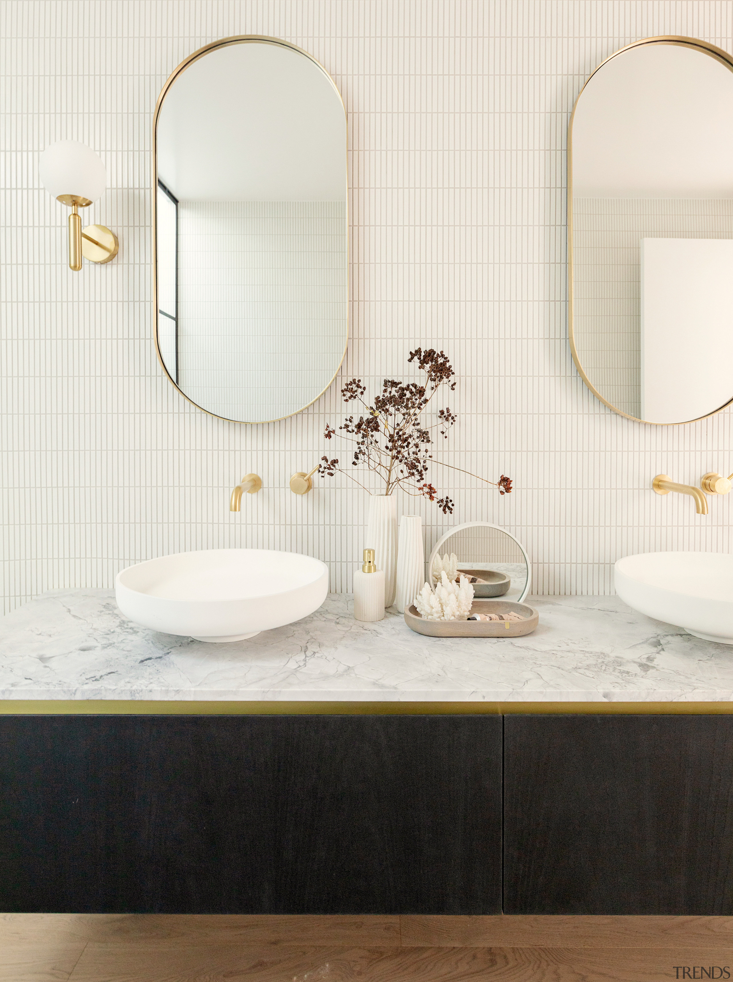 The stone benchtop has a leathered finish. - 