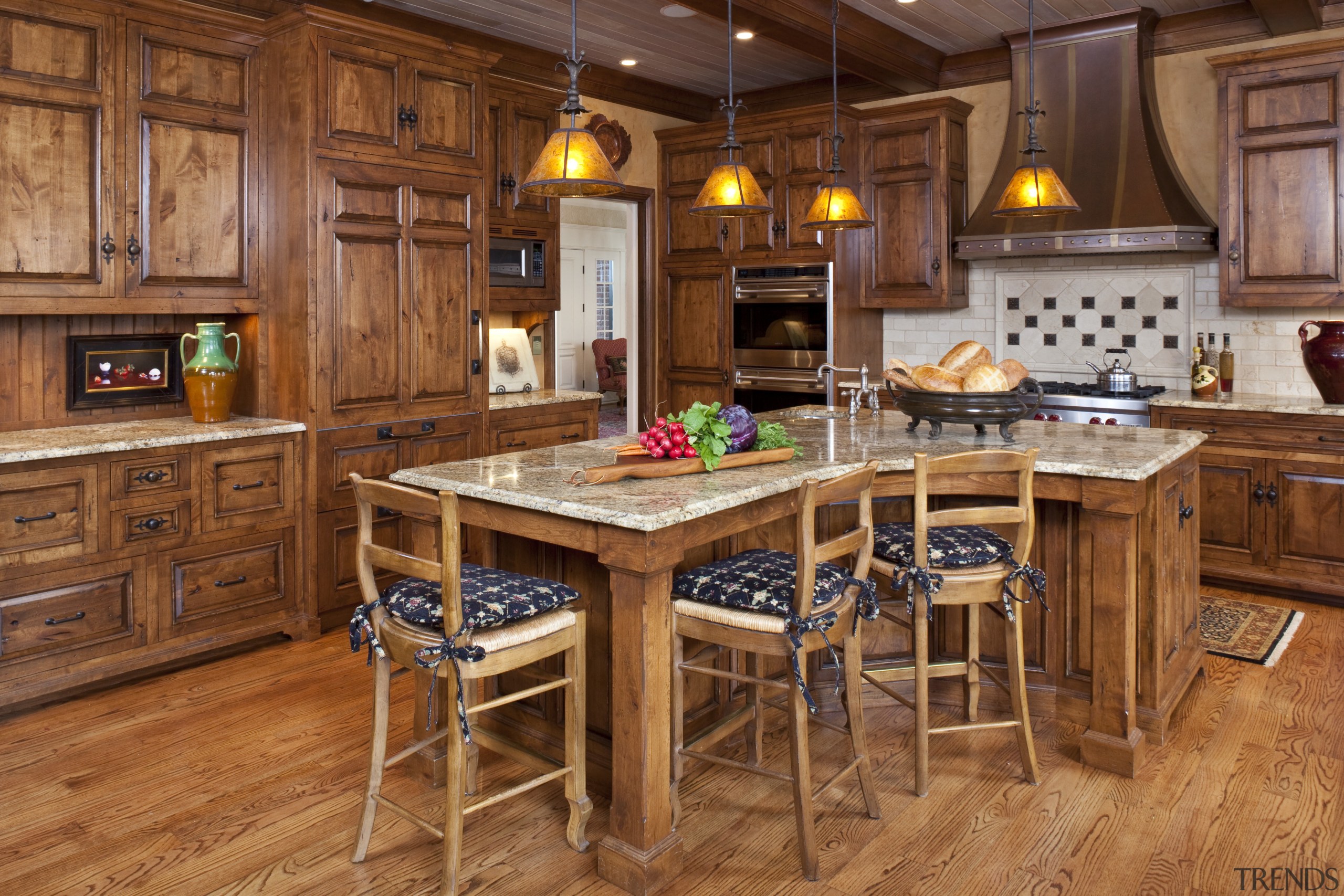 A view of a kitchen by Bruce Kading cabinetry, countertop, cuisine classique, dining room, flooring, furniture, hardwood, interior design, kitchen, room, table, wood, wood flooring, brown