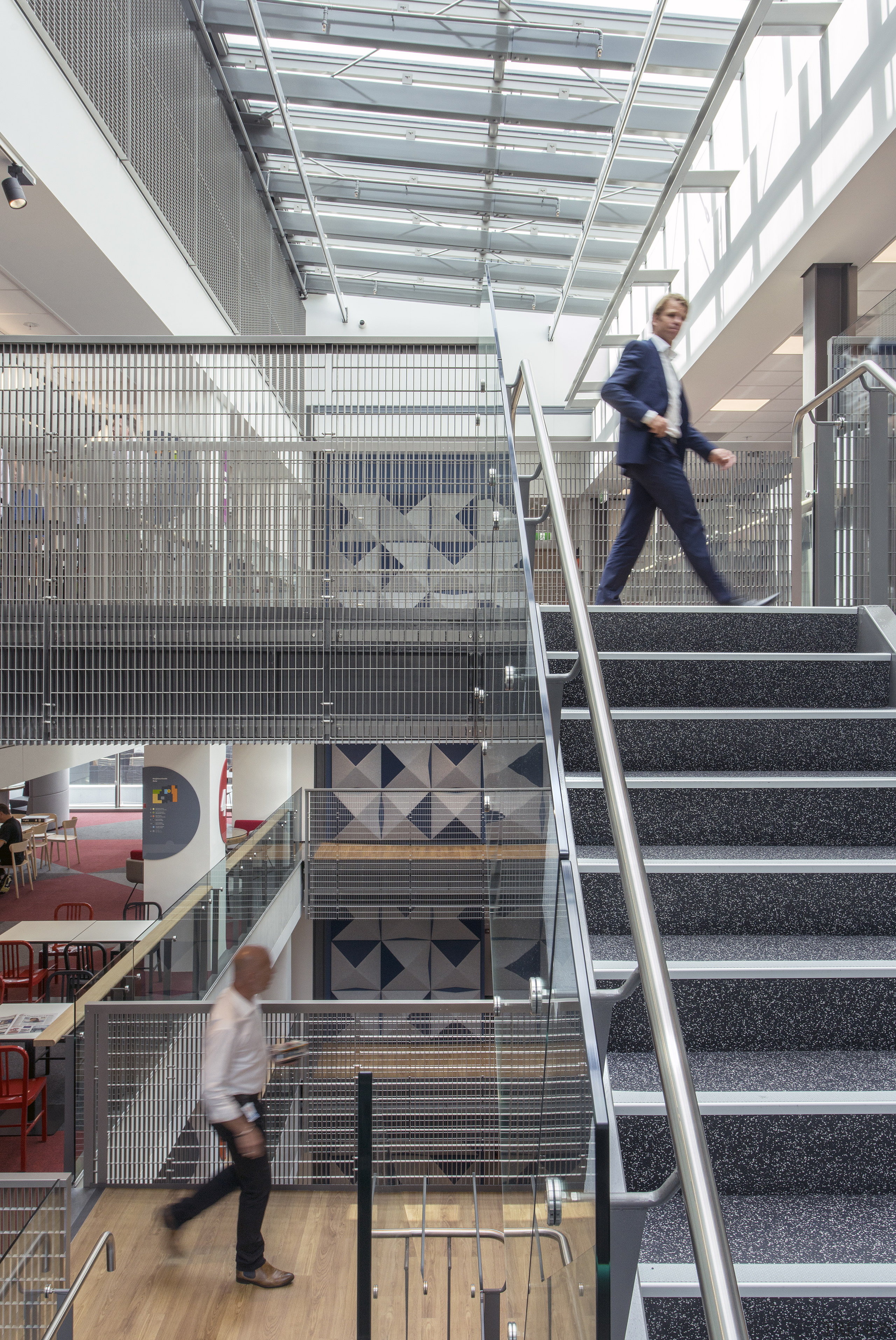 Glass, steel mesh and wood planking abound in architecture, building, daylighting, facade, handrail, metropolitan area, stairs, steel, structure, urban area, gray