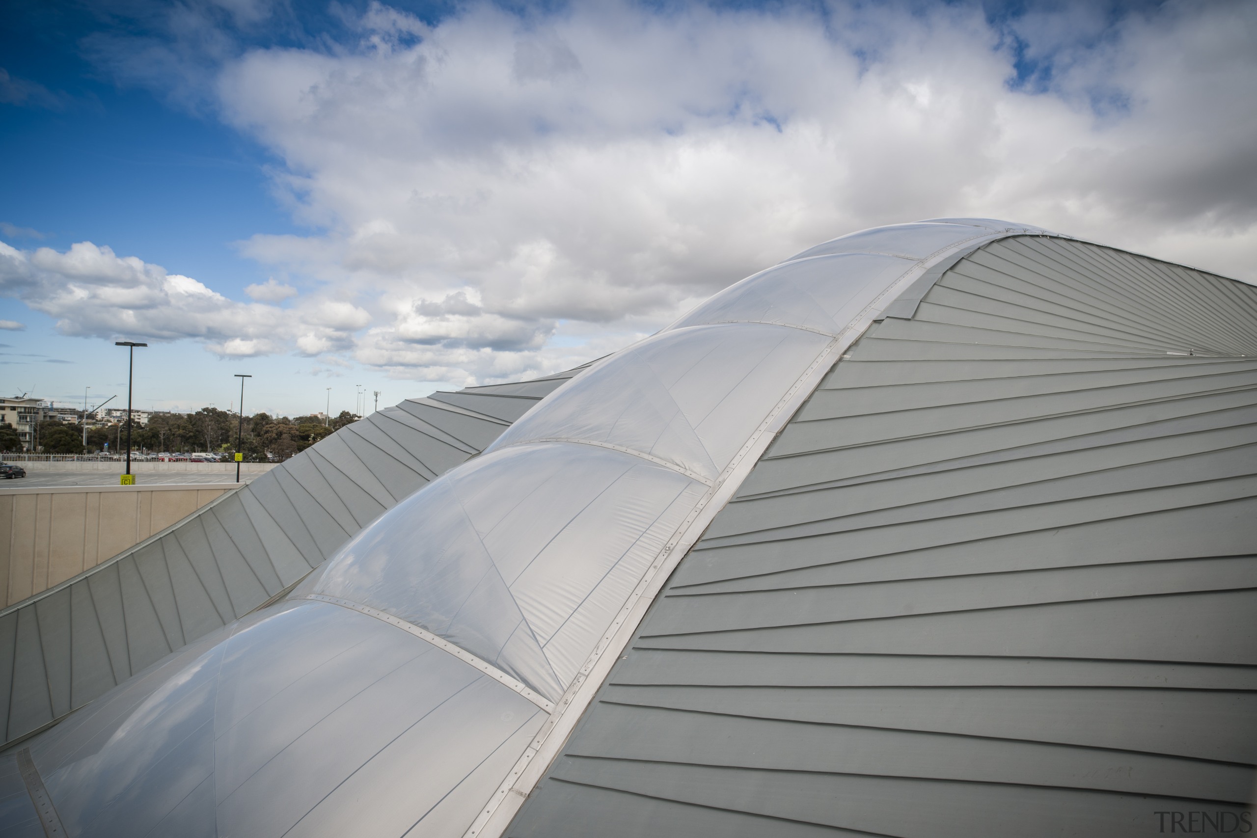 The roof was chosen in part for its architecture, atmosphere of earth, cloud, daylighting, daytime, line, roof, sky, structure, sunlight, gray