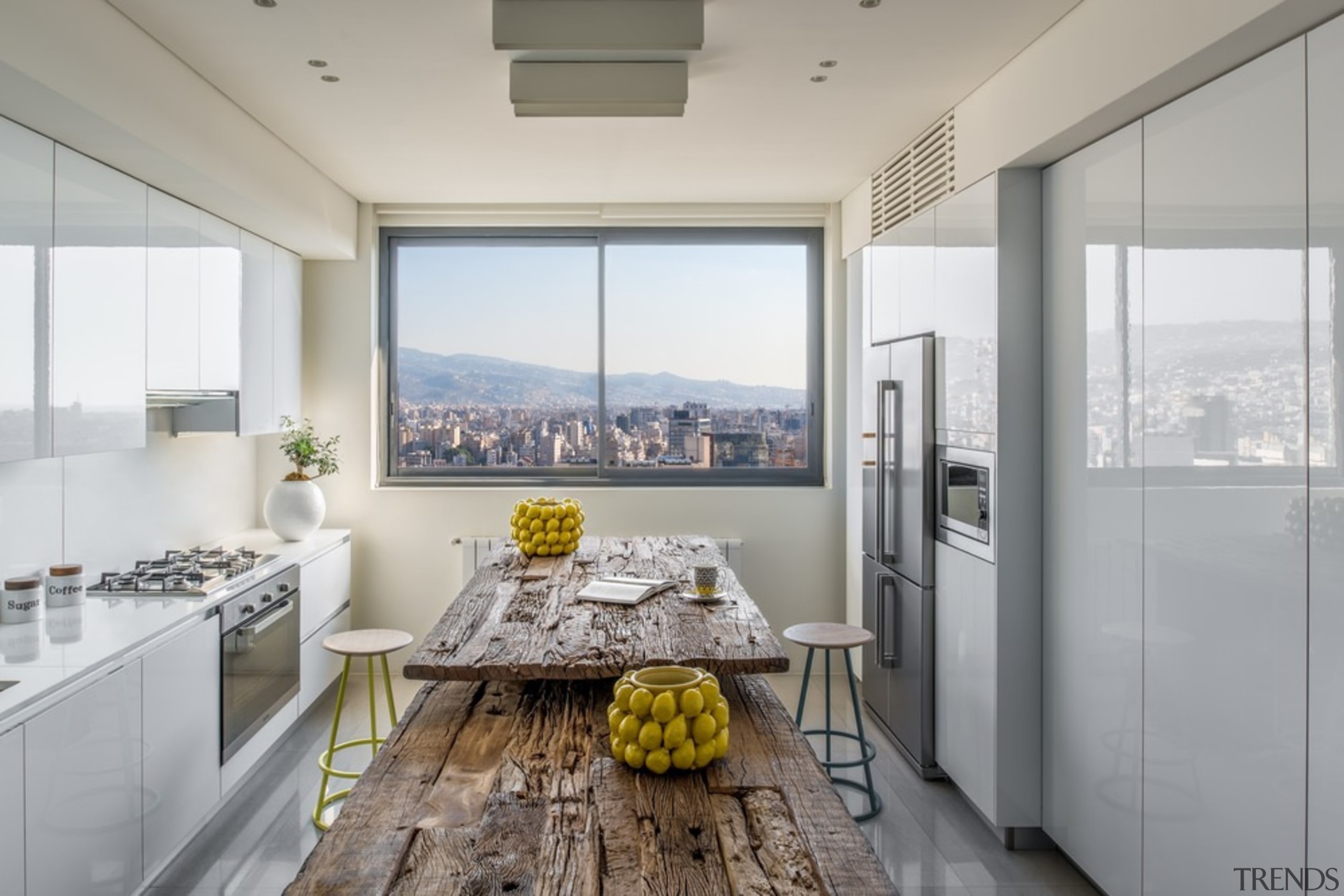 ​​​​​​​- Kitchen by Alno kitchens- Wood erosion table apartment, architecture, building, ceiling, countertop, daylighting, design, floor, flooring, furniture, home, house, interior design, kitchen, living room, loft, property, real estate, residential area, room, table, window, yellow, gray