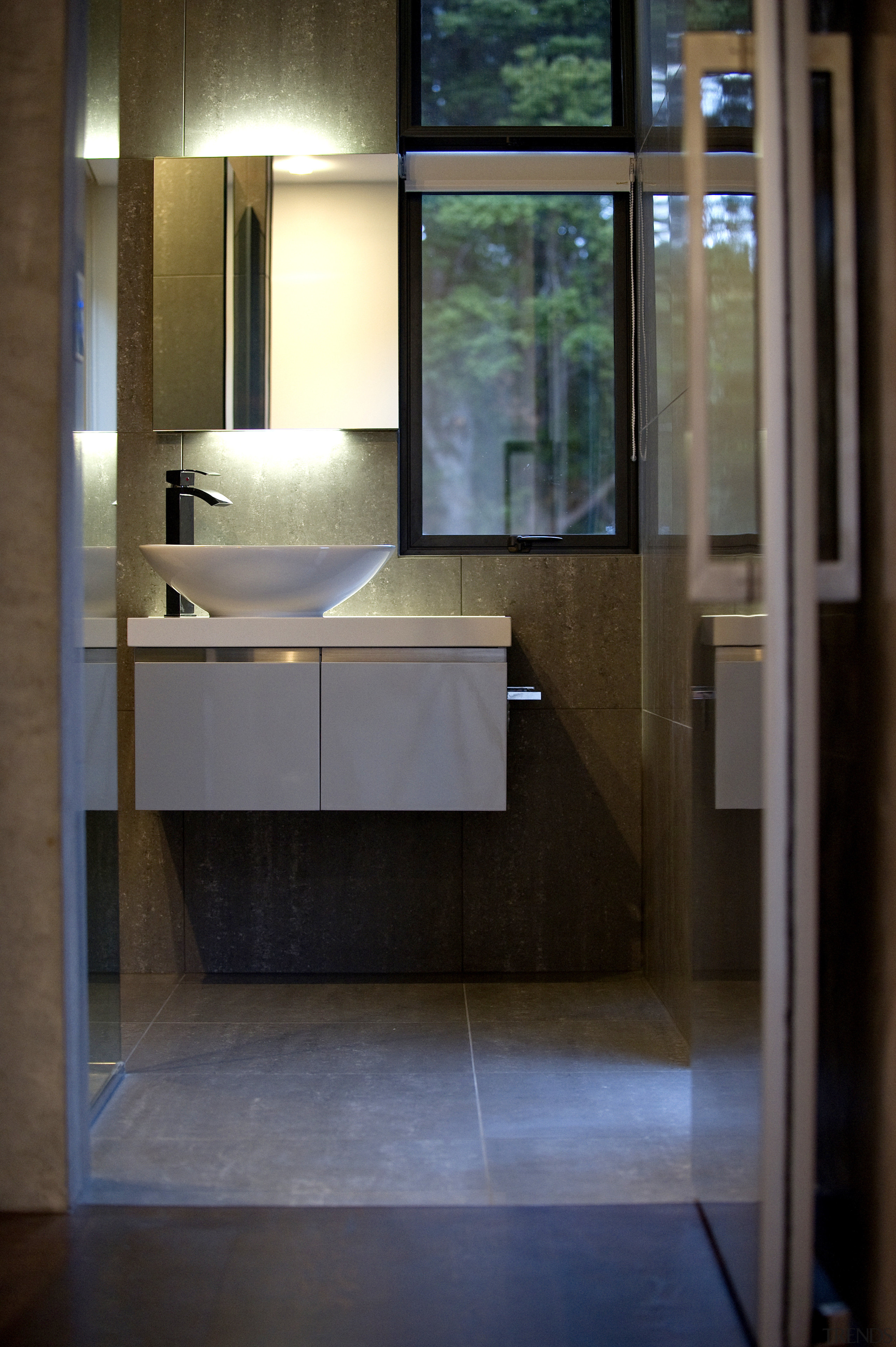 This home was designed by Gerrad Hall, the architecture, bathroom, floor, glass, interior design, room, sink, black, brown