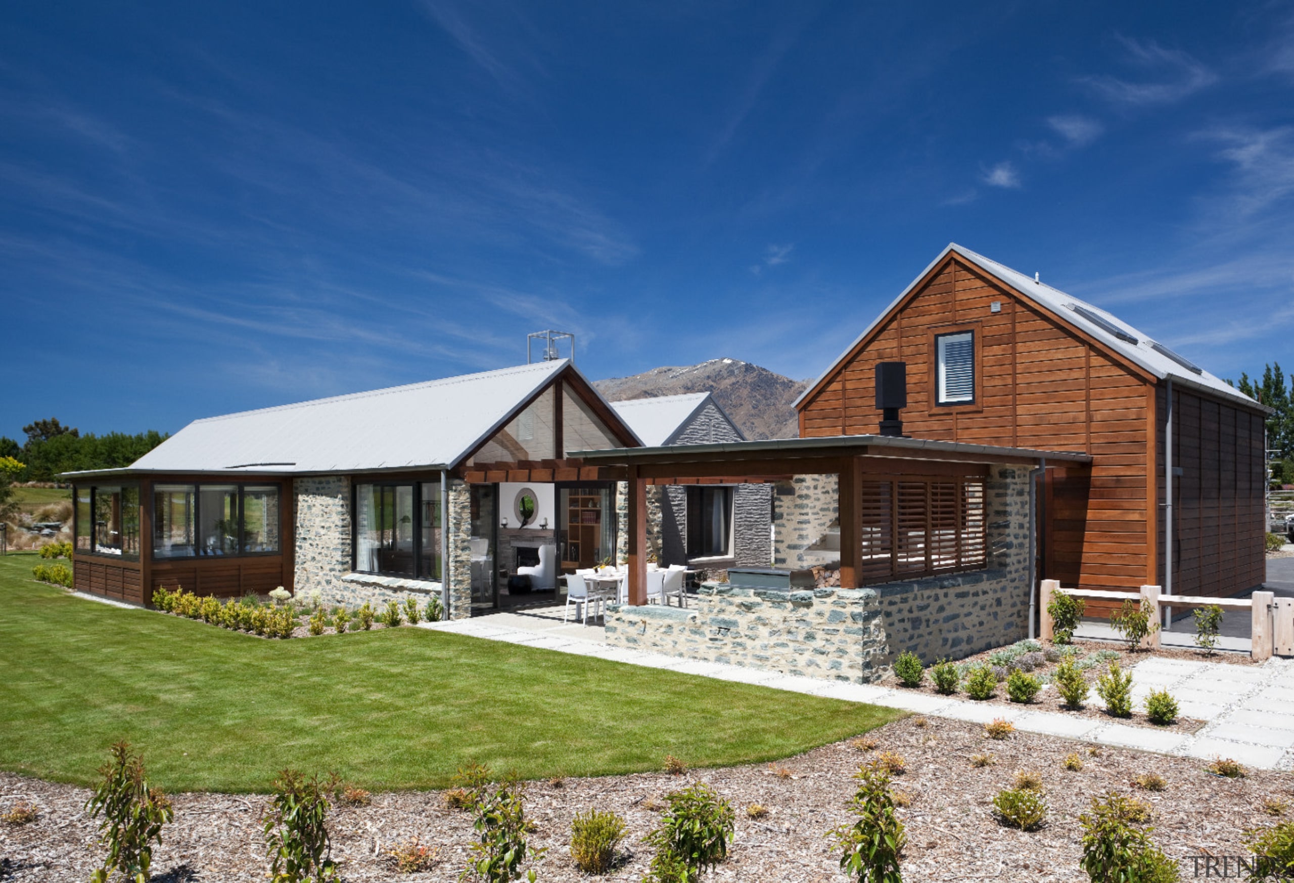 A modern take on an historic stone cottage cottage, elevation, estate, facade, farmhouse, home, house, landscape, property, real estate, residential area, siding, blue